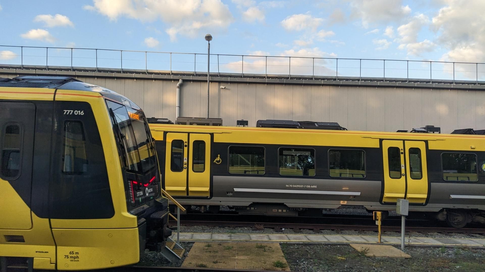 Two parked Merseyrail trains