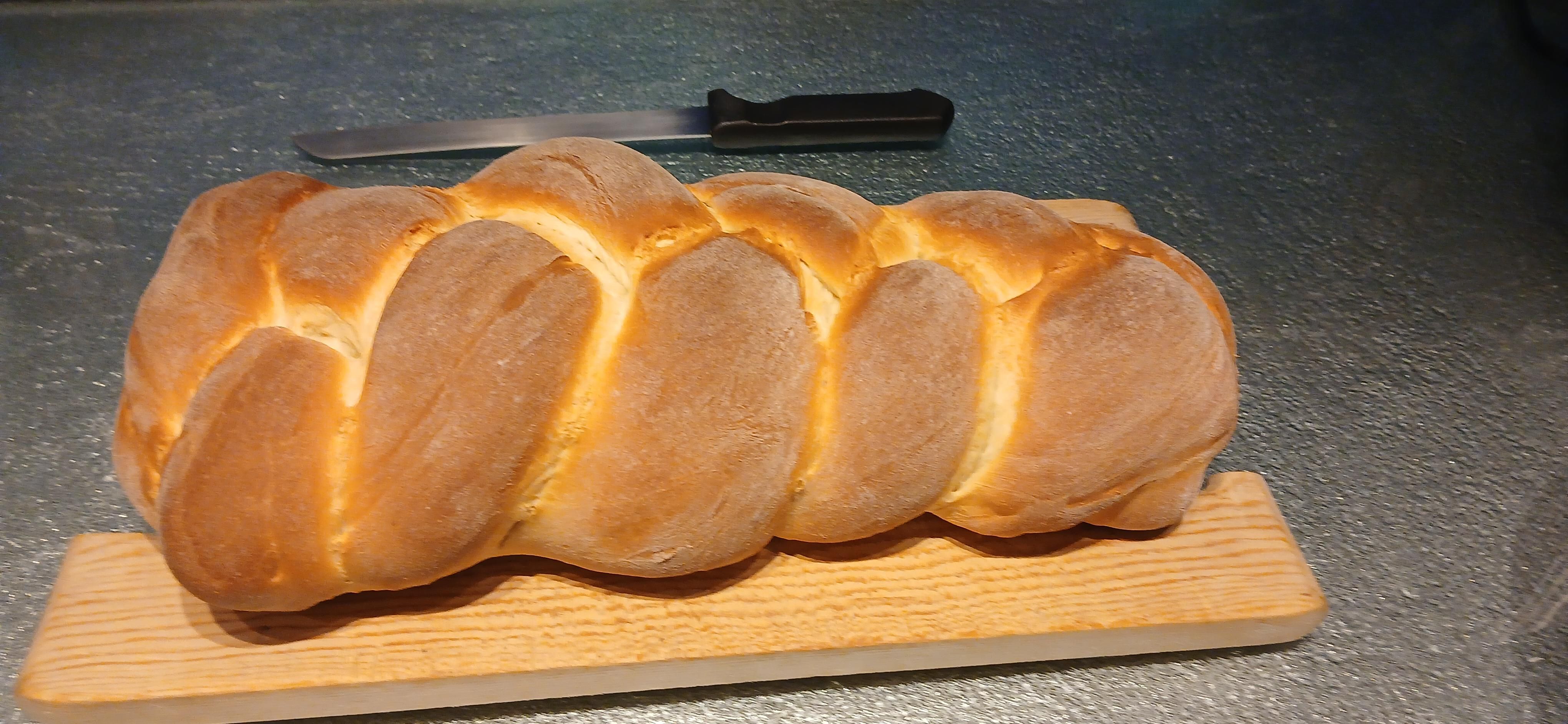 Fresh zopf on a cutting board 