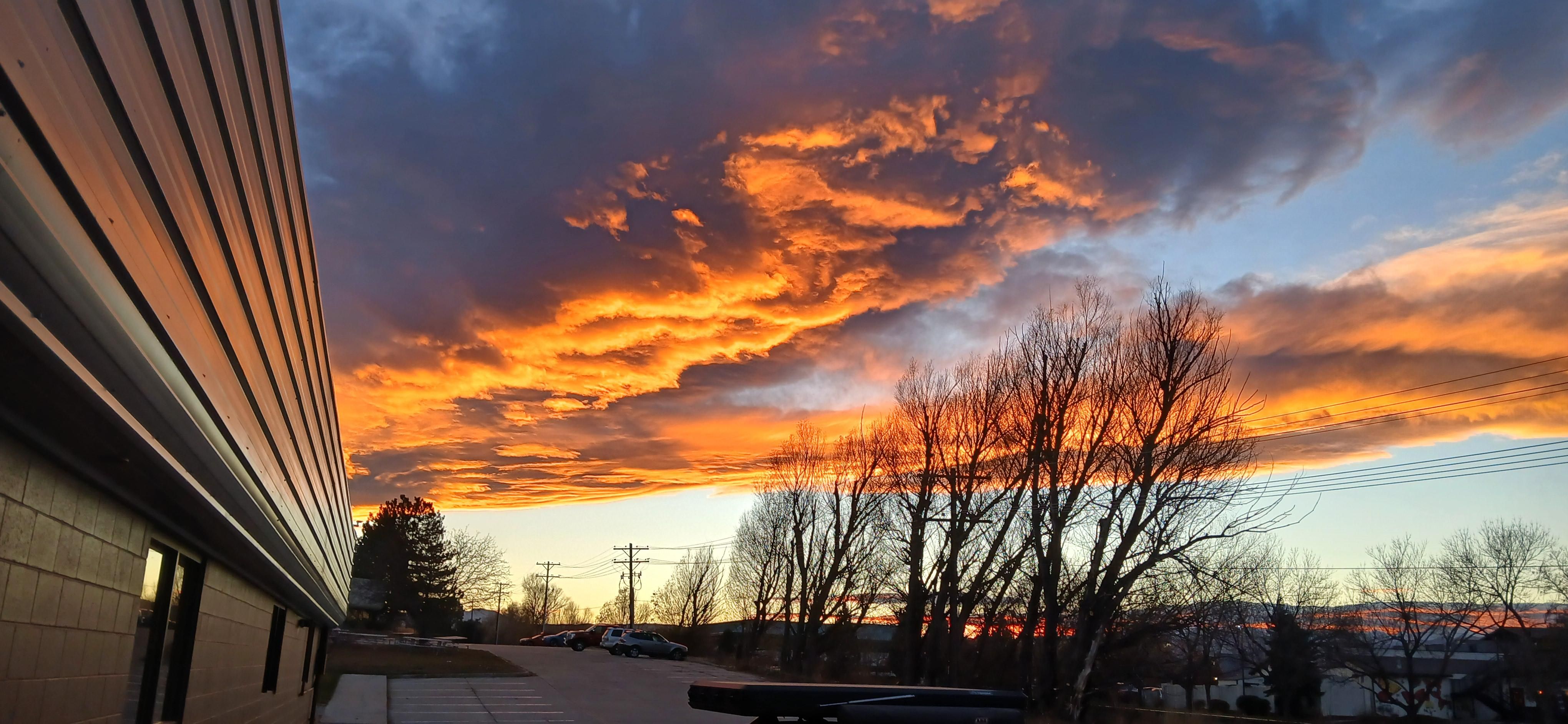 Purple and red and yellow and on fire
And the clouds would catch the colors everywhere 