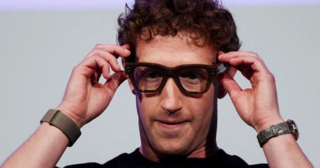 Meta CEO Zuckerberg with clunky black glasses that have cameras in them. 