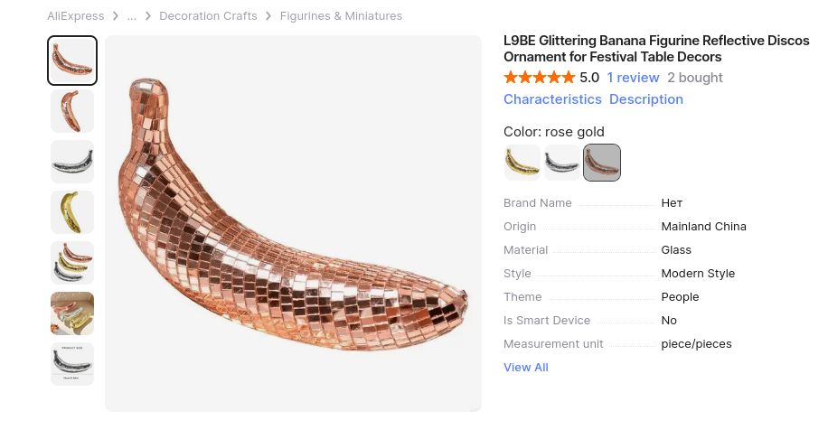 L9BE Glittering Banana Figurine Reflective Discos Ornament for Festival T able Decors. Color: rose gold, also bas gold and silver. It's like a disco ball, but a banana