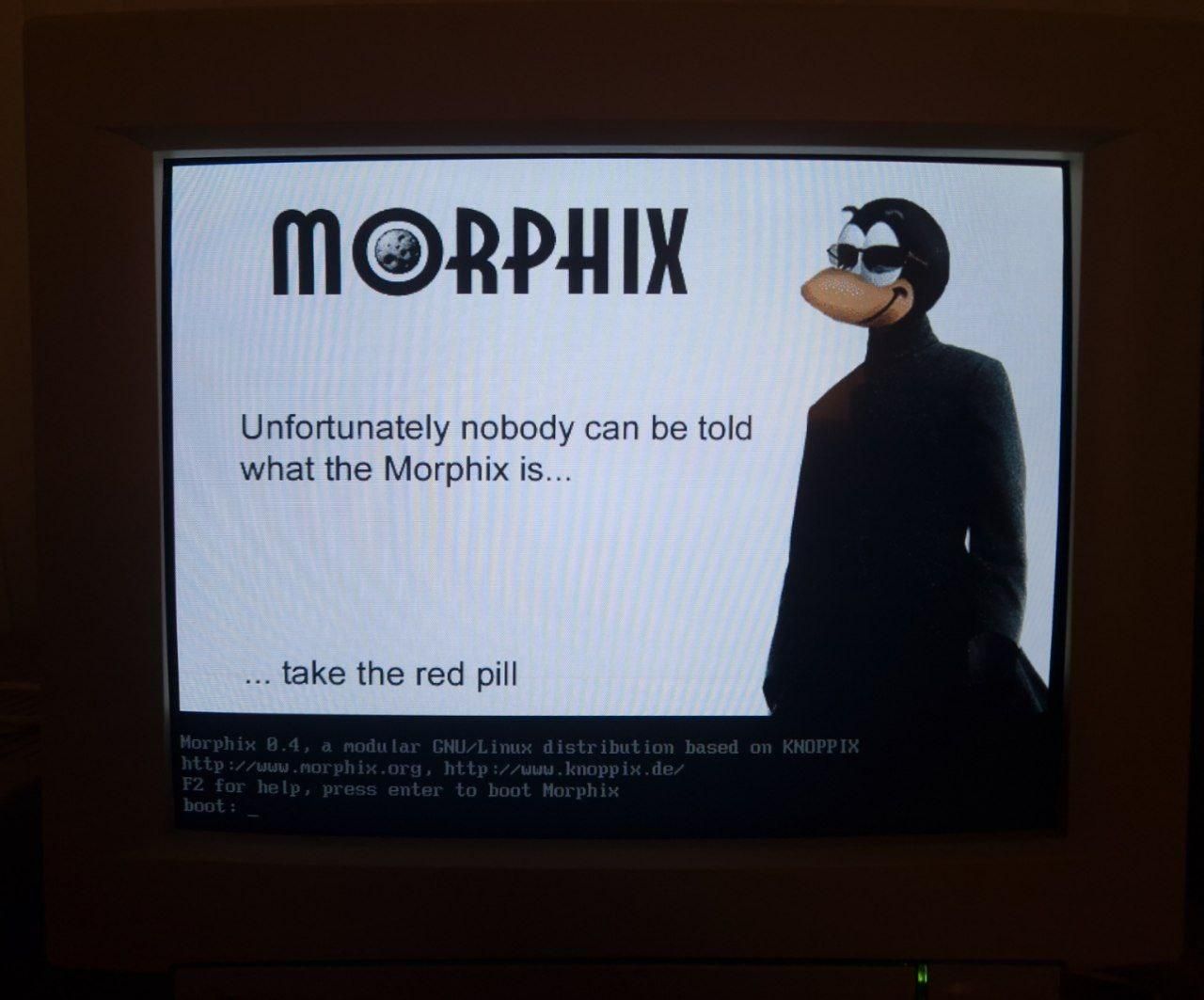 A photo of a CRT showing Morphix OS bootloader

It shows a collage of Morpheus from the Matrix with a cartoon penguin head, and says "Morphix. Unfortunately nobody can be told what the Morphix is..."