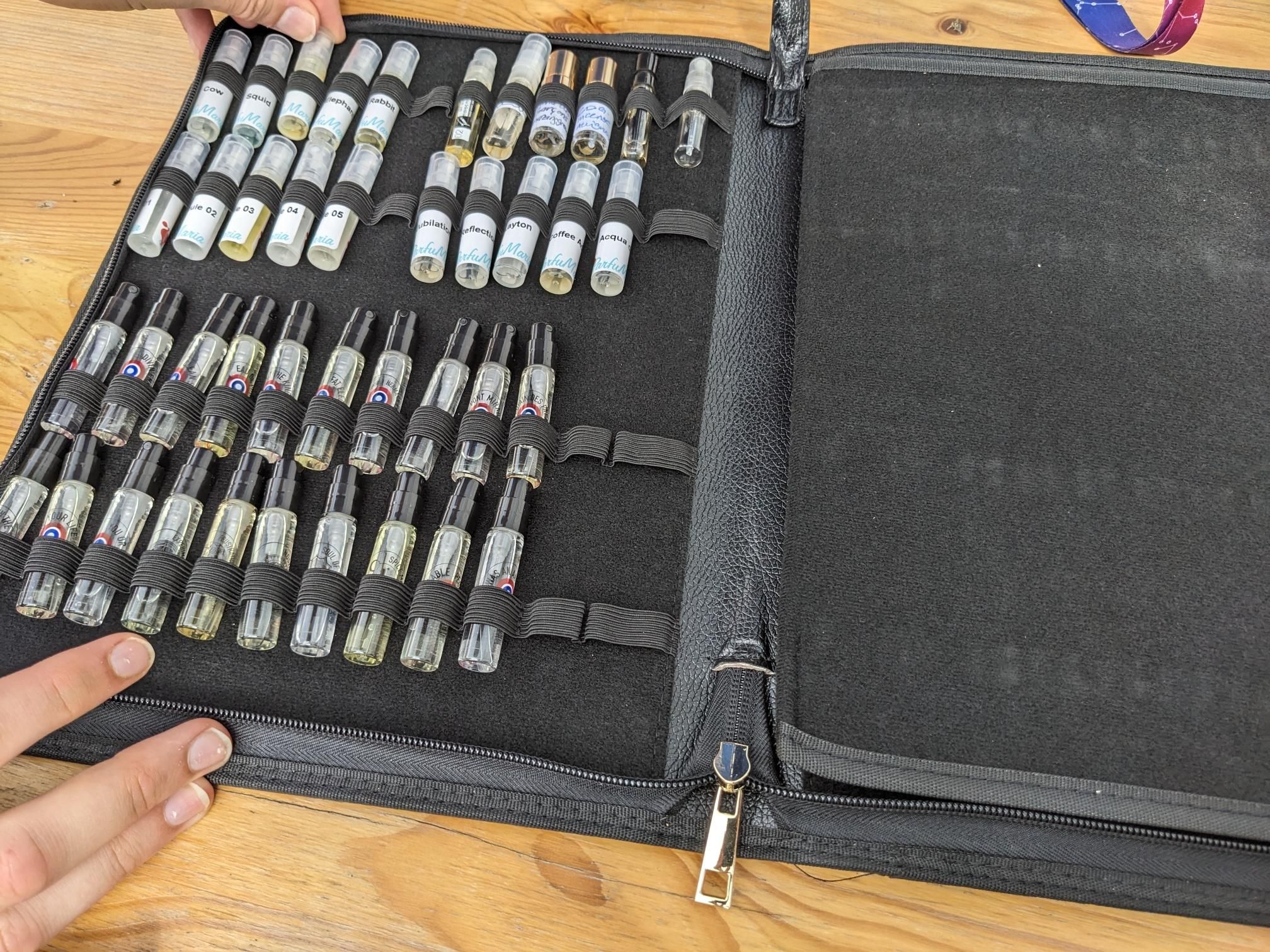 A set of small spray bottles.