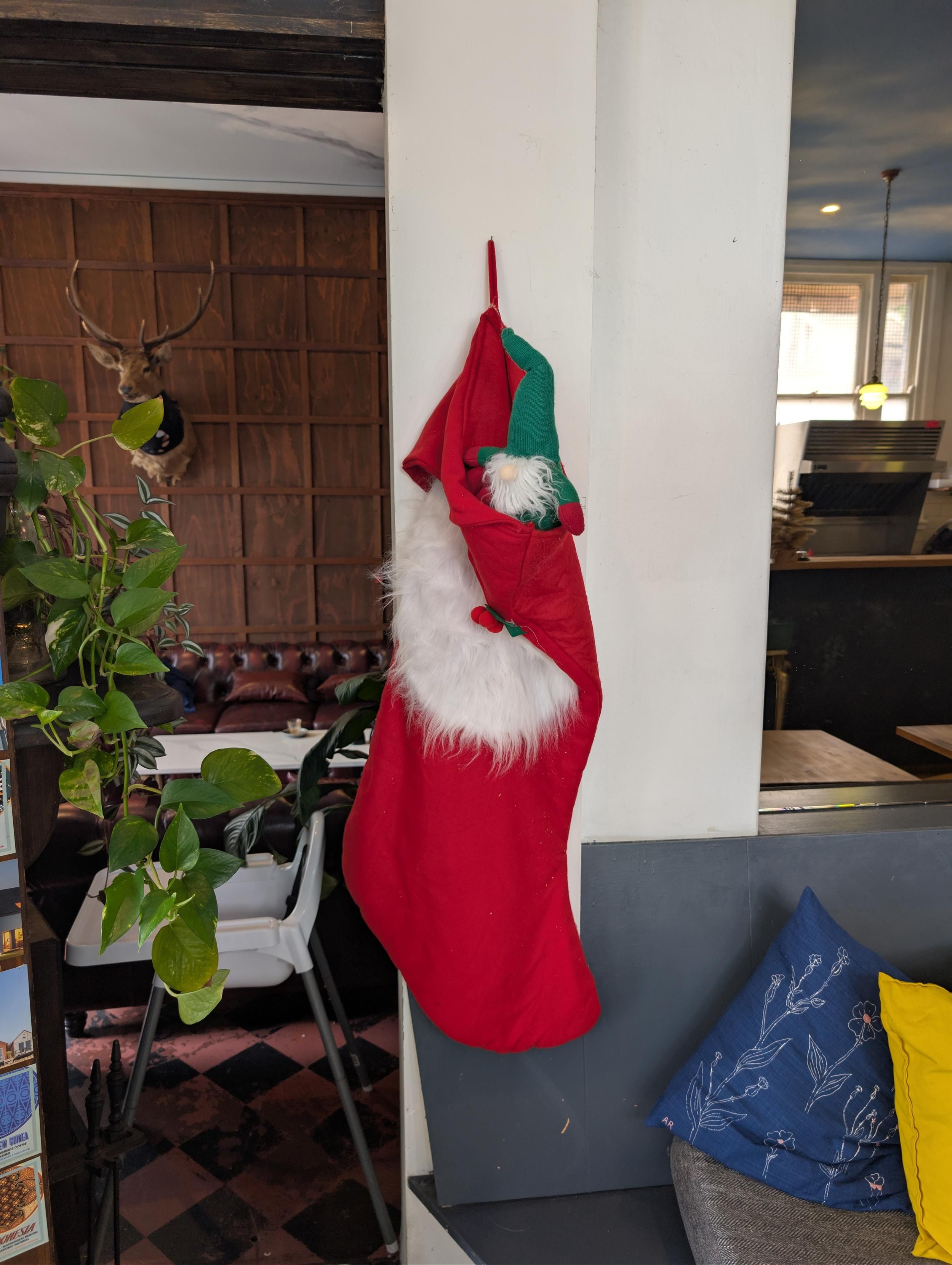 Elf on the shelf is elf in the sack, a big red Santa sack