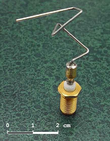 An "evolved antenna", which apparently does a superb job of meeting its requirements, but looks like a length of coathanger wire got pulled through the gears of a 19th century steam powered pumping station before being given to a three year old to play with.