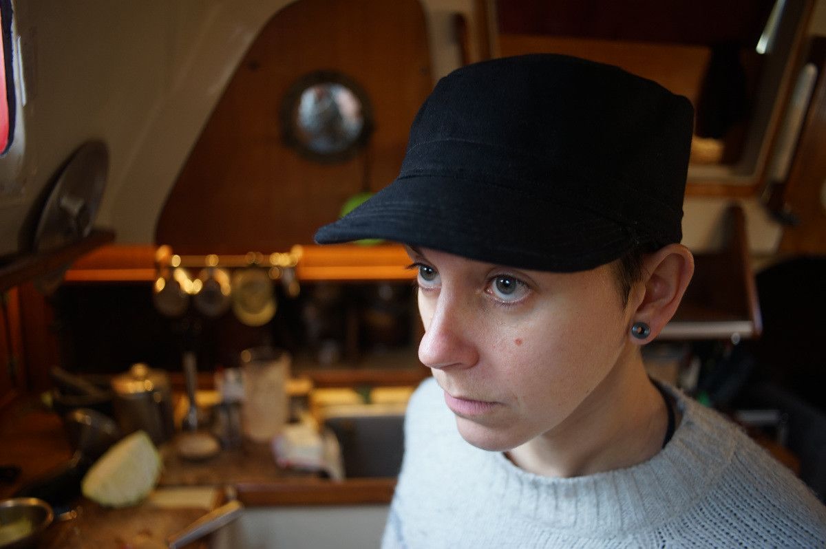 rek is wearing a black cap they just put together out of 12 oz cotton canvas.