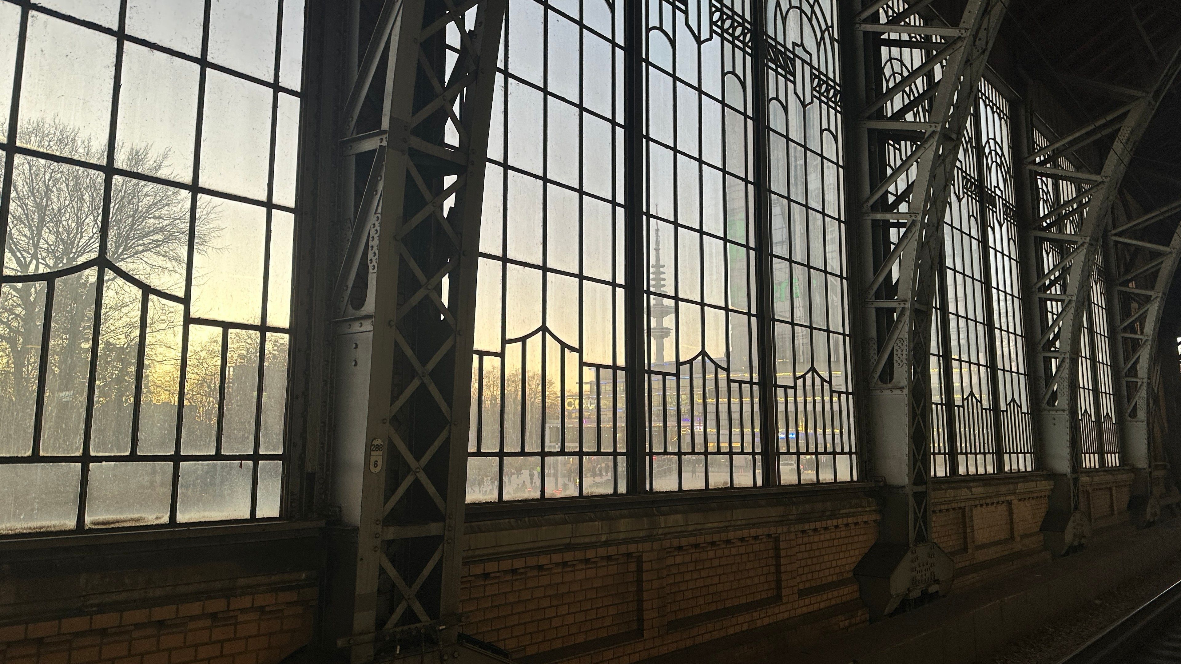 CCH and radio tower seen through the windows of the train station. 