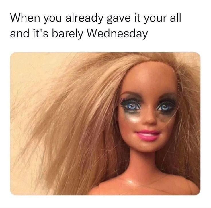 Barbie doll with what looks like smeared mascara and a smile with the caption "When you already gave it your all and it's barely Wednesday."
