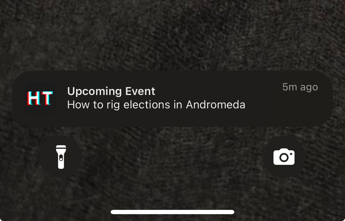 An iOS notification from HackerTracker which reads “How to rig elections in Andromeda”