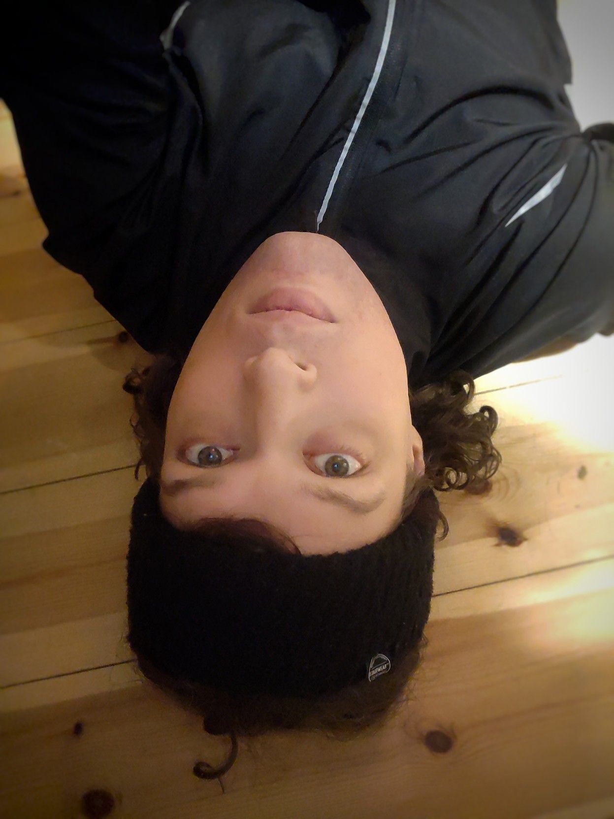 me unshaved on the floor in running gear