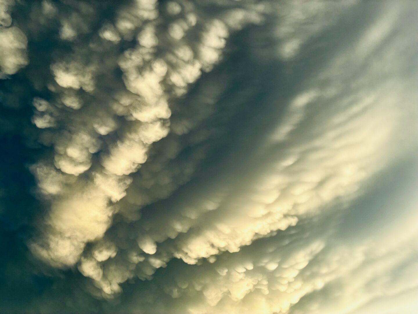 A color photo showing dramatic billowing clouds.