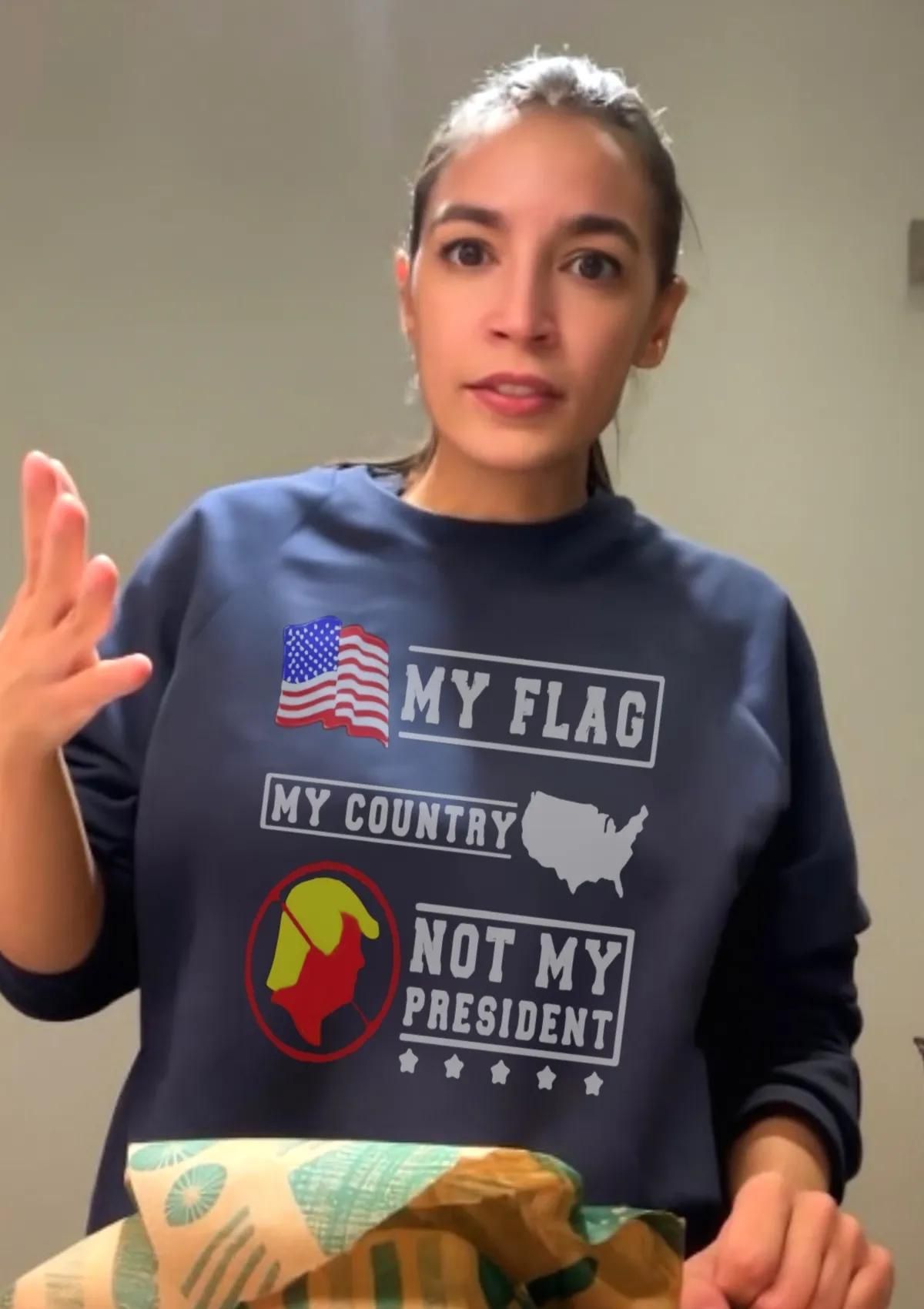 Alexandria Ocasio-Cortez with T-Shirt, my flag my country Trump not my president