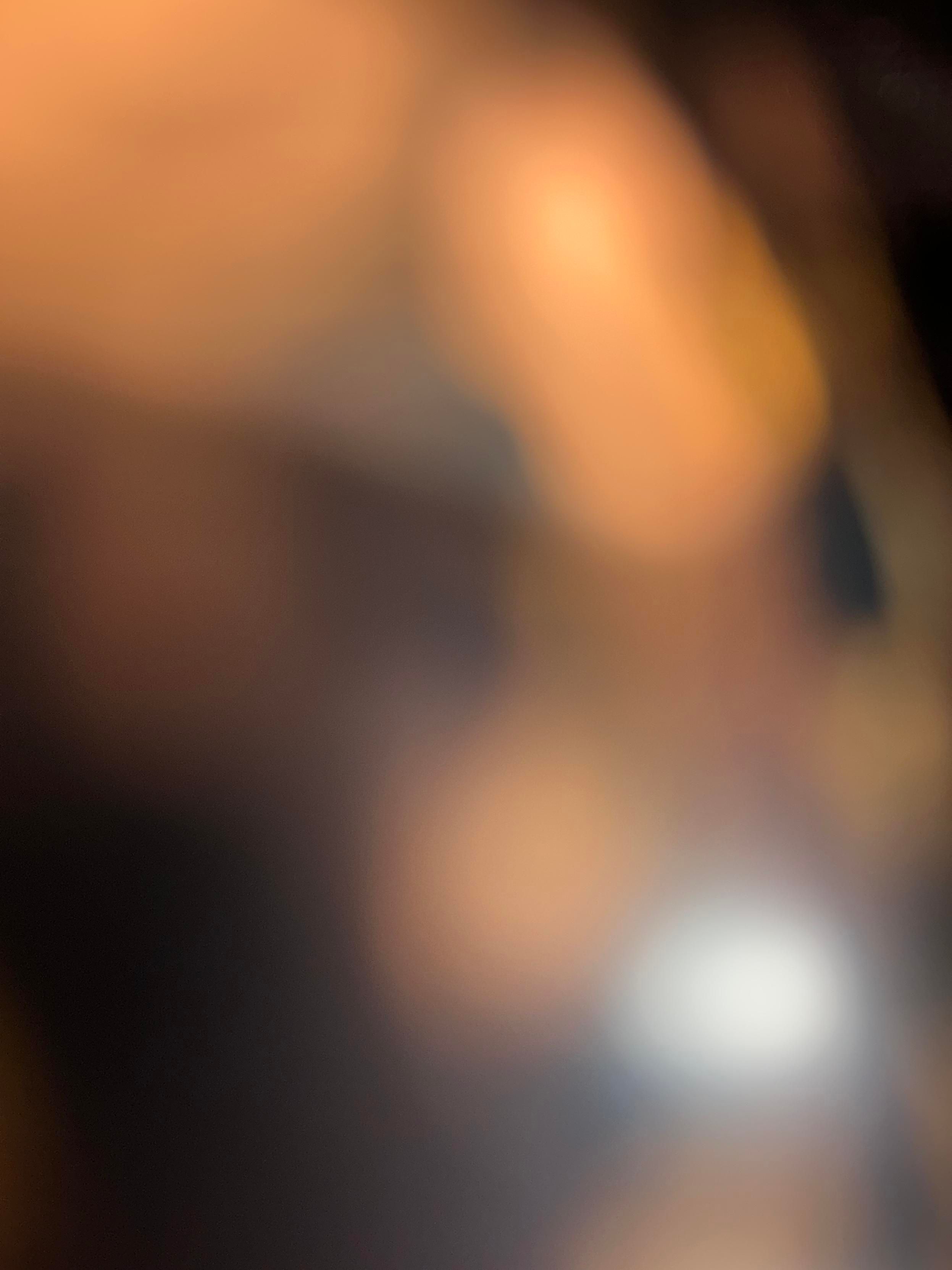 A photo featuring an unfocused blur of colours.