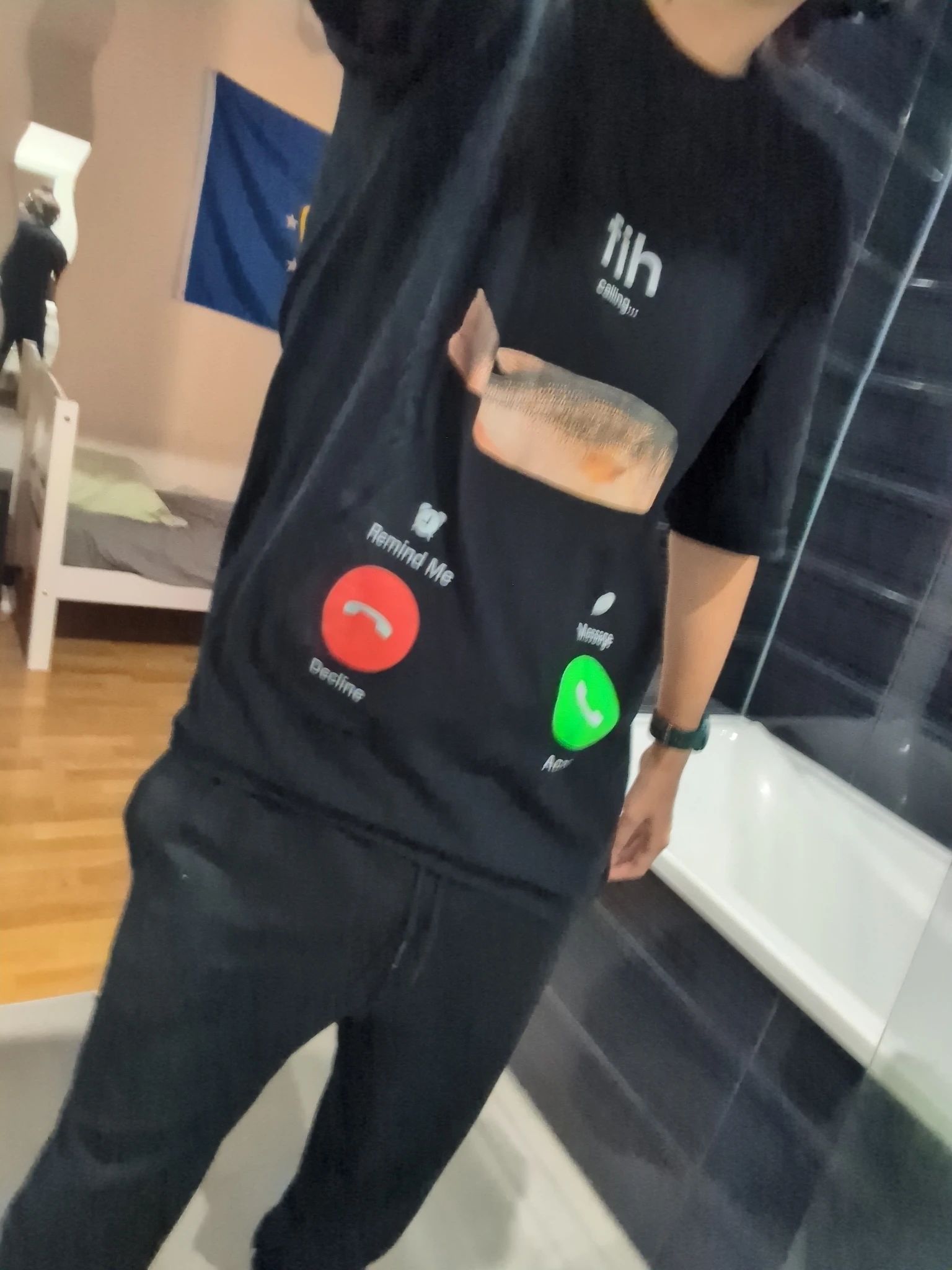 hot pic of me wearing a diabolical "fih is calling" t-shirt styled like the iOS call indicator