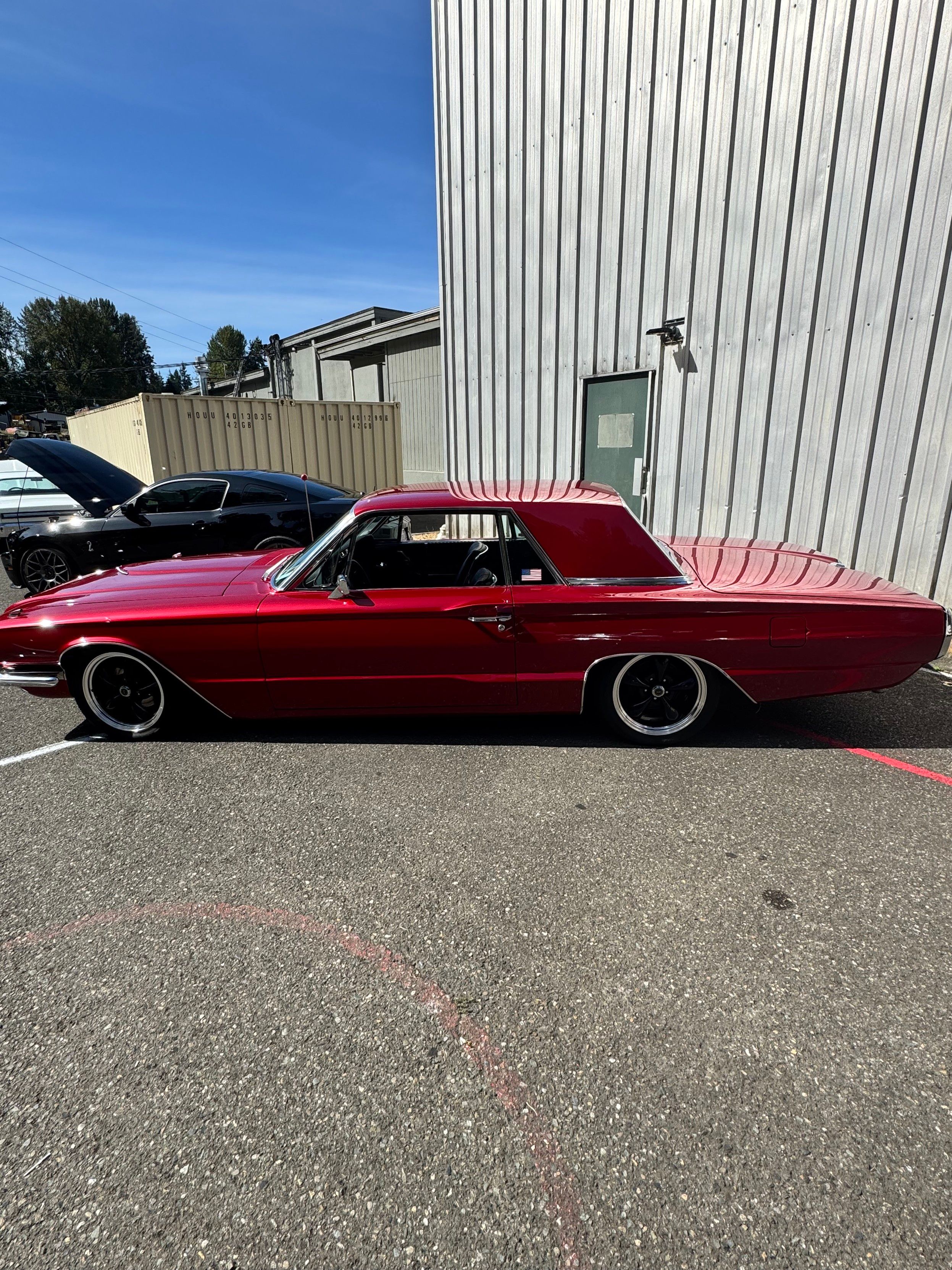 My personal fav of the show, a 66 T-Bird in pristine condition. Metallic red.