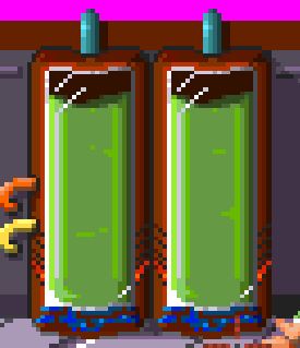 The containers I was talking about in the post: 2 glass vertical containers with green liquid inside.