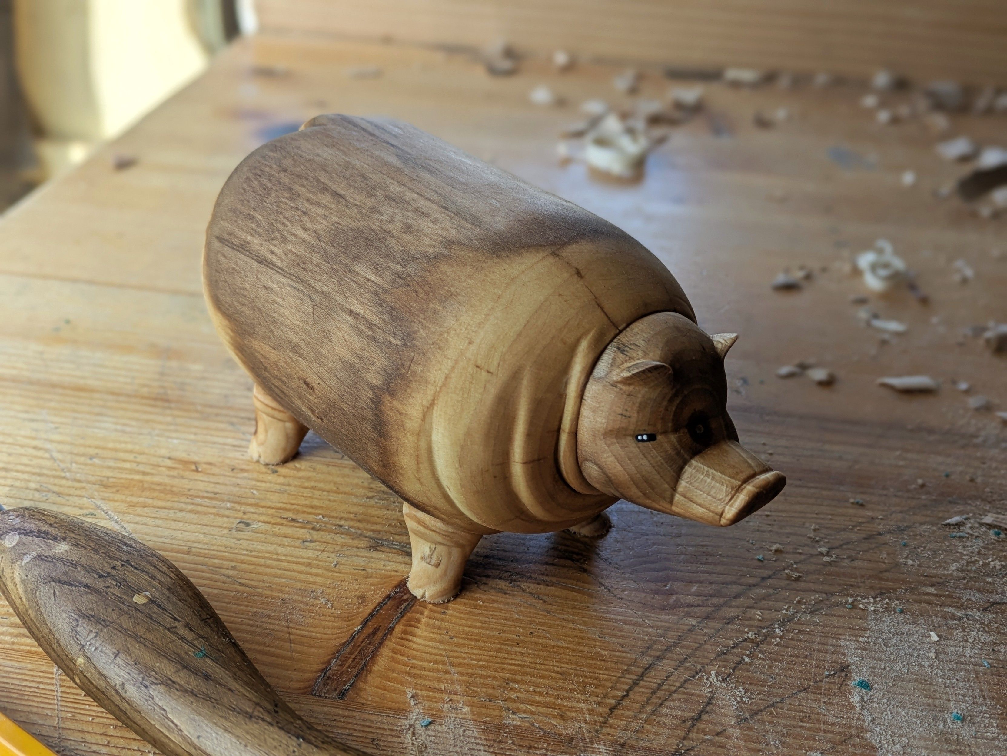 Woodcarved plump hog