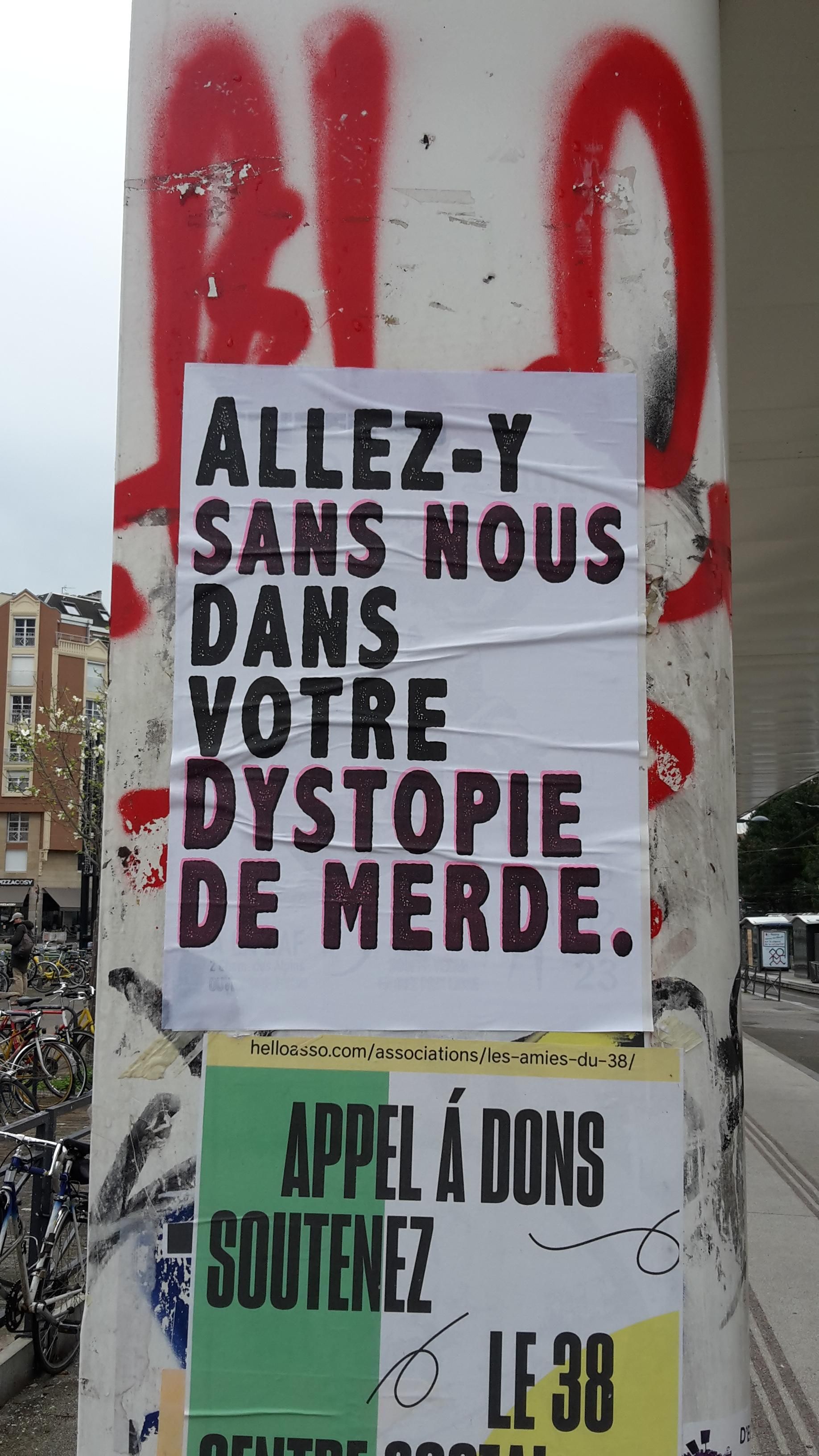 TEXTE : "ALLEZ Y SANS NOUS DANS VOTRE DYSTOPIE DE MERDE" "Go ahead without us in your shitty dystopia. "