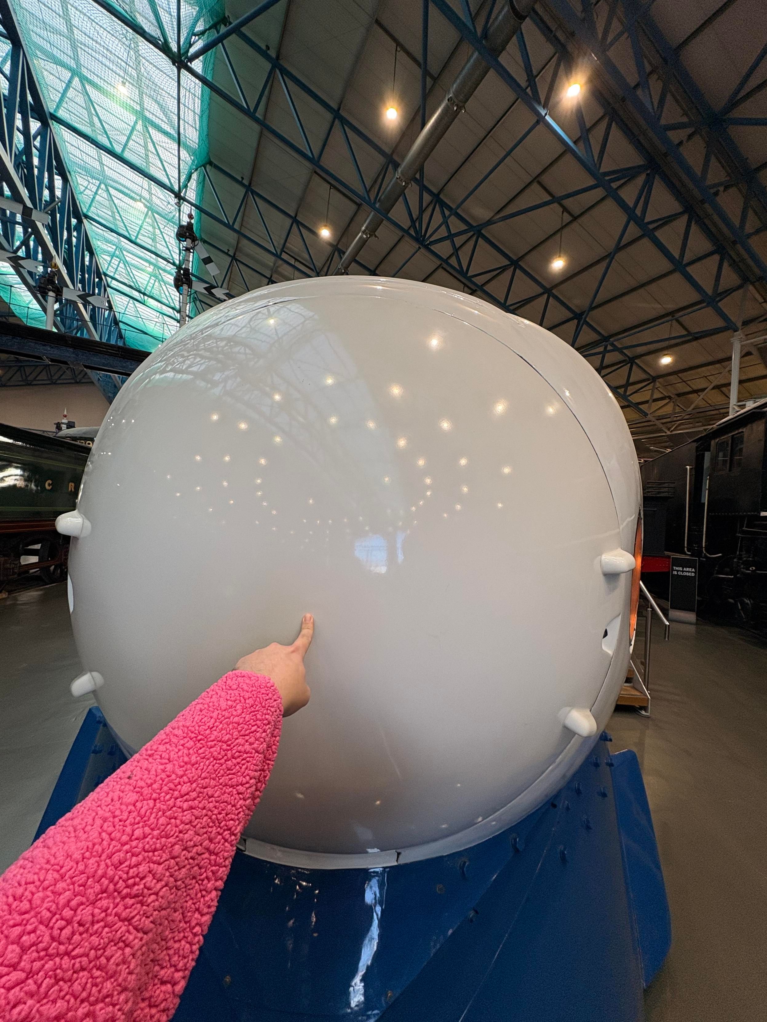 me booping (touching the front end of) the 0 series shinkansen train at national railway museum in York