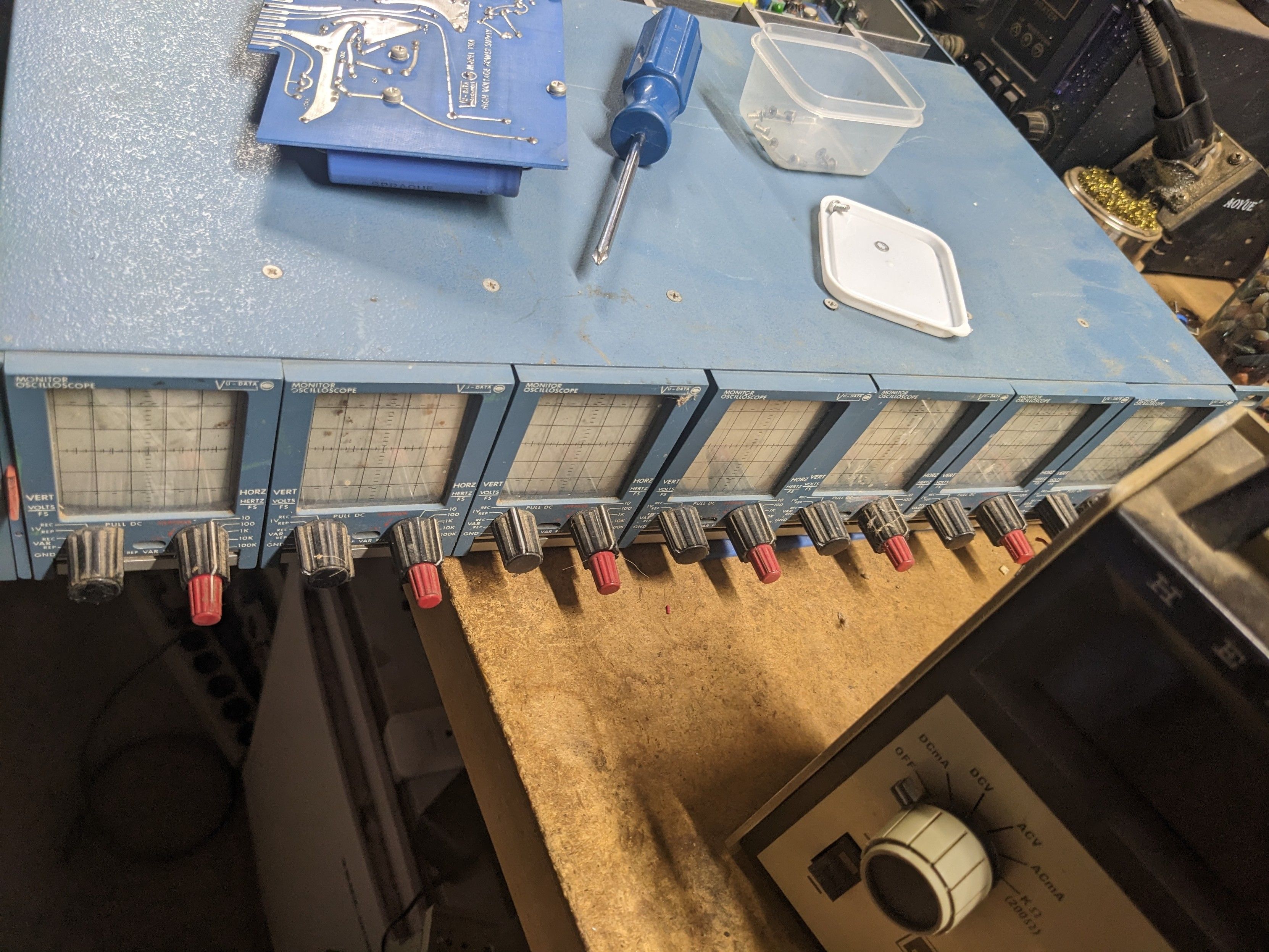 Blue, rackmount box with 7 tiny CRT's all in a row, each with it's own set of knobs. One knob adjusts the timescale.  The other, I'll explore later