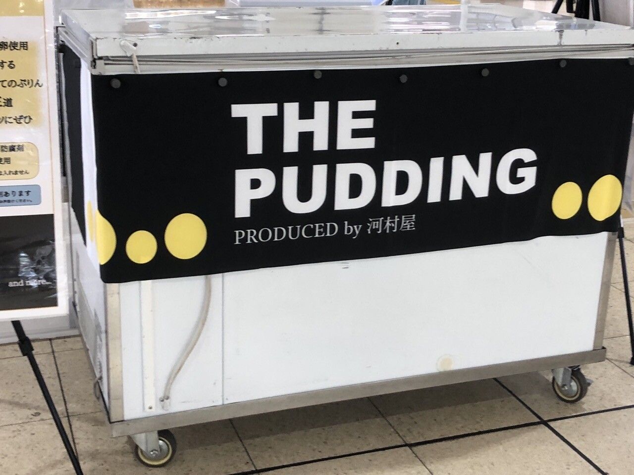 A sign that says the pudding