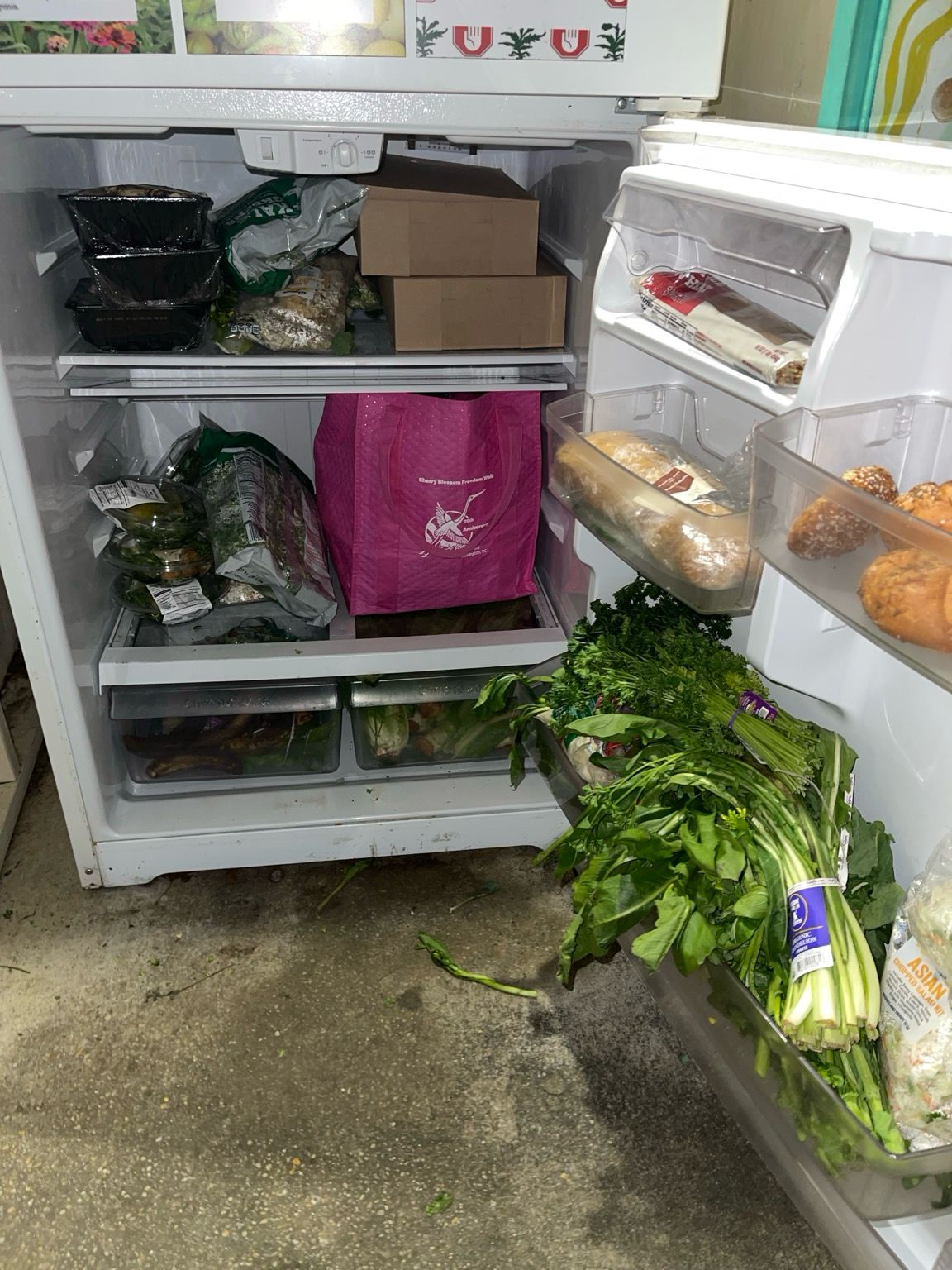 Donuts in a sea of healthy food shoved into the fridge. 