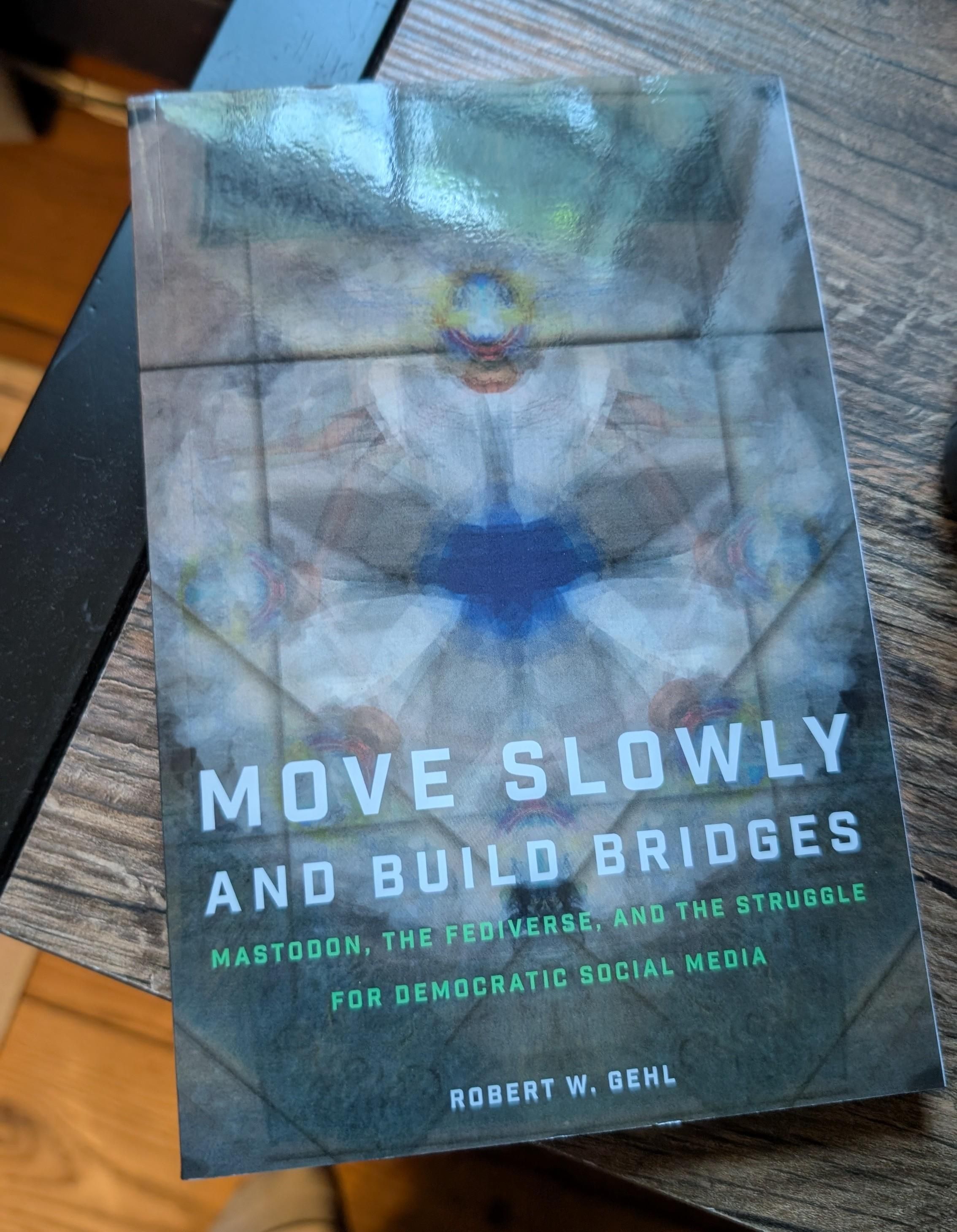Book cover of Move Slowly and Build Bridges by Robert W Gehl