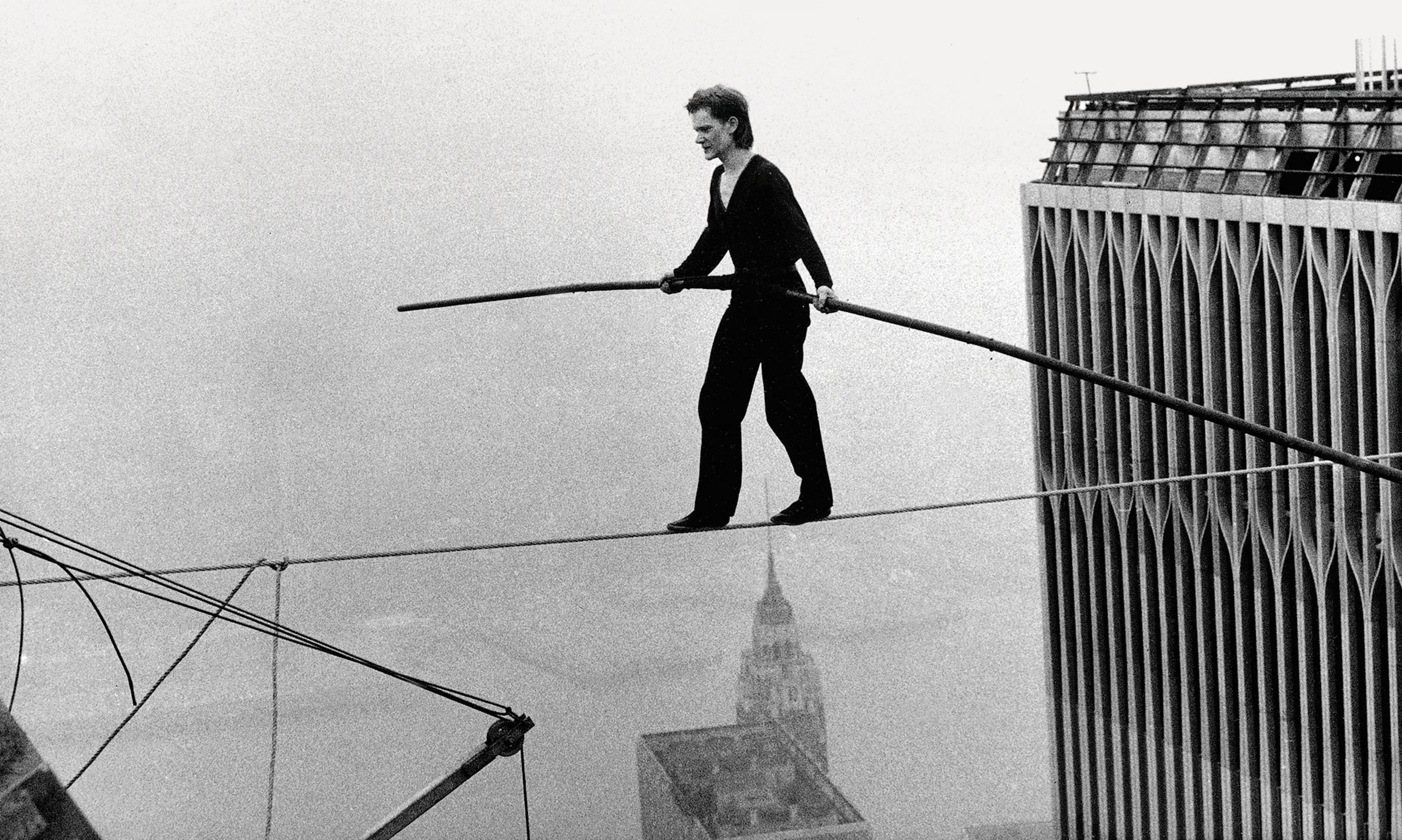 Philippe Petit walking a tightrope between the Twin Towers in August 1974

Credits: Alan Welner/AP