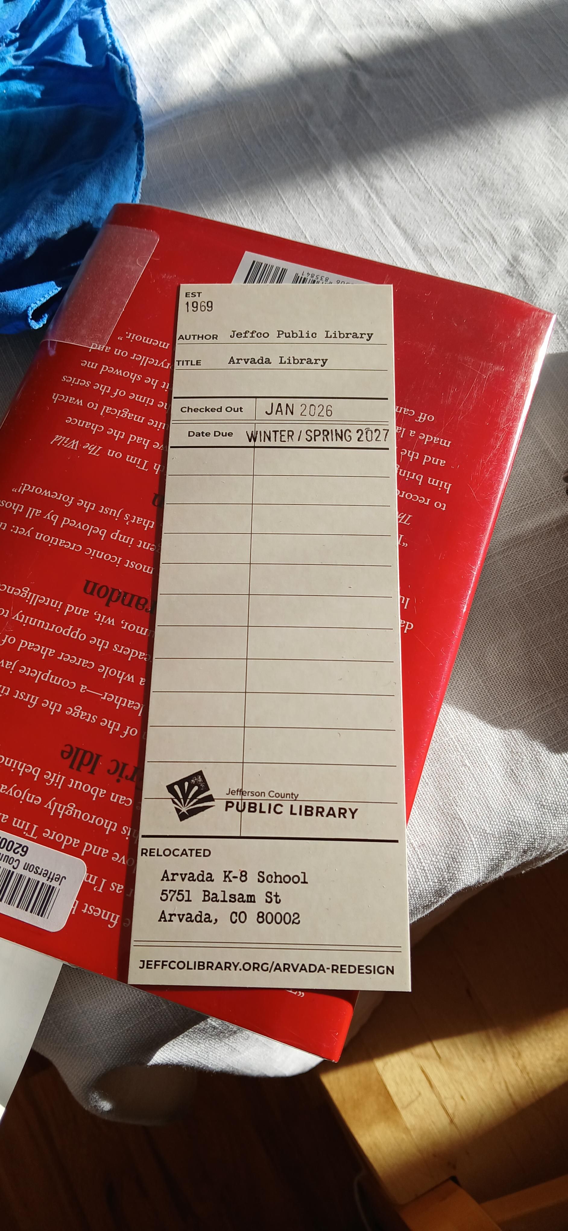 Library card with stamped return date