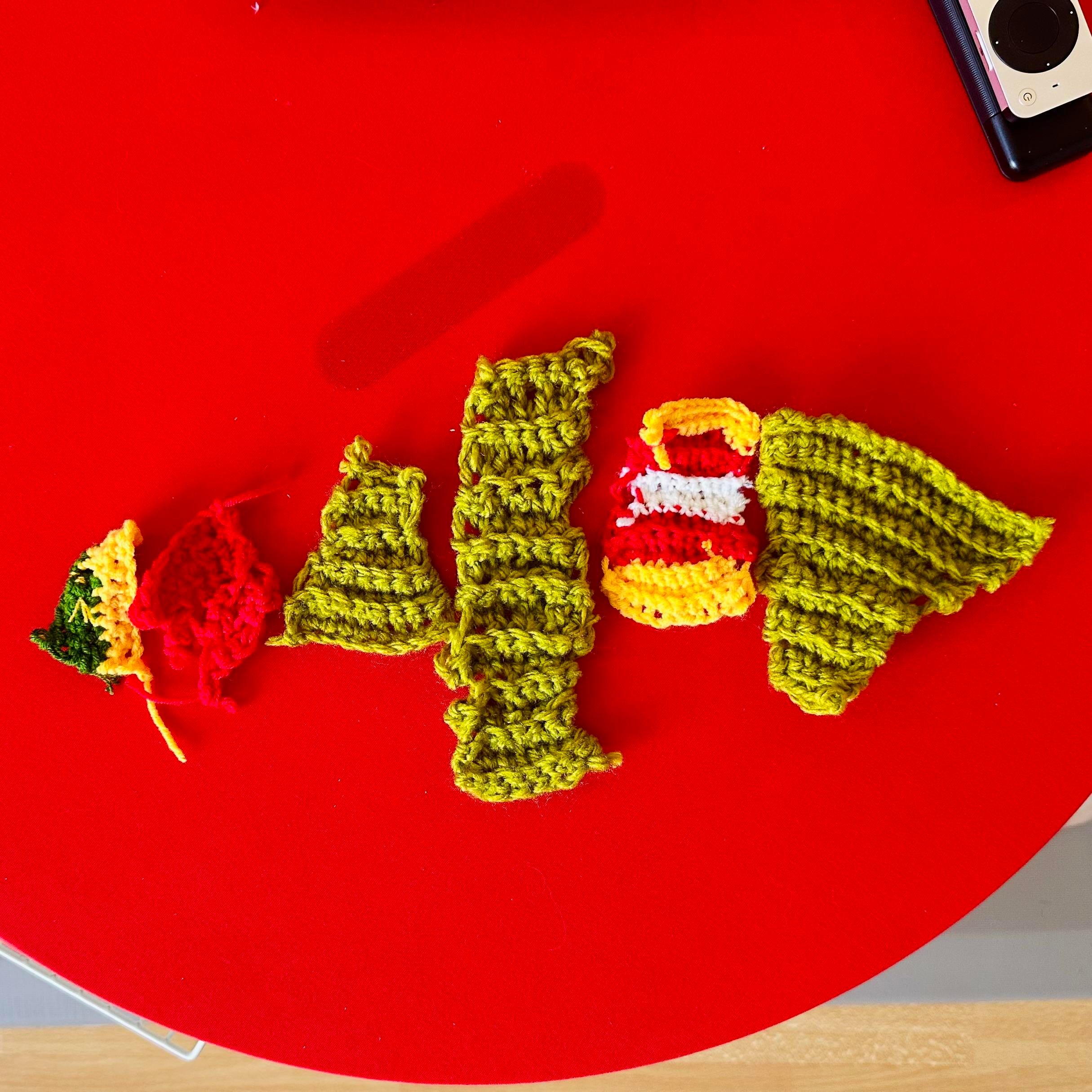 A photo of a few crochet small items in increasing size and with fewer holes haha