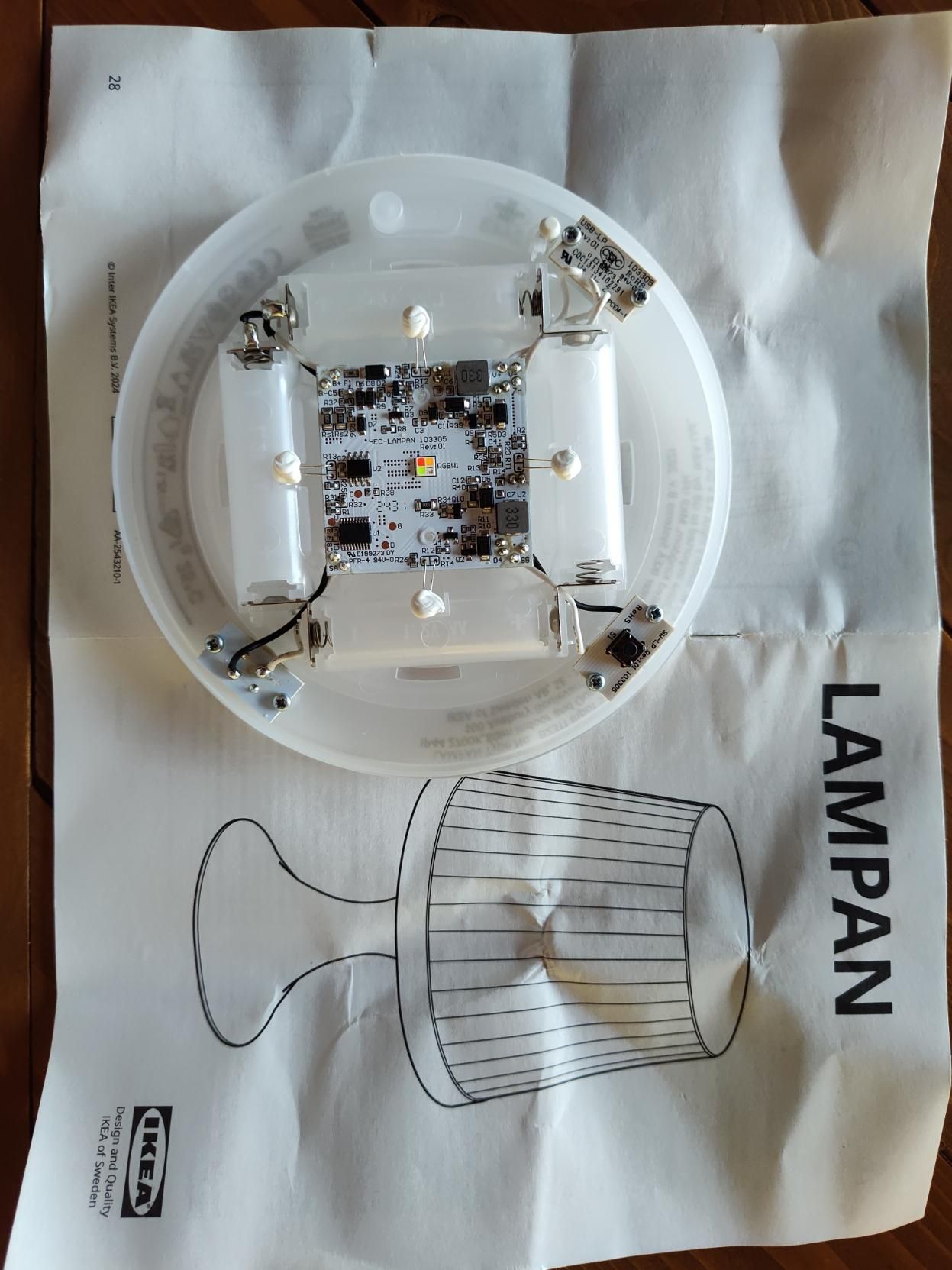 Circuito stampato con elettronica di controllo e LED della lampada. Parte superiore.
