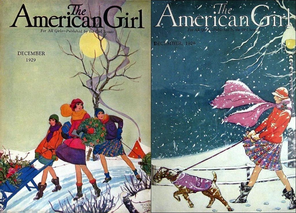 Two vintage "The American Girl" magazine covers, published by the Girl Scouts. Left: December 1929 cover depicting three young women in colorful winter clothing who push a wheelbarrow, carry an evergreen wreath, and pull an evergreen tree through snow. Right: December 1928 cover depicting a young woman with a billowing scarf, walking a dog on a lead as snow falls around them.
