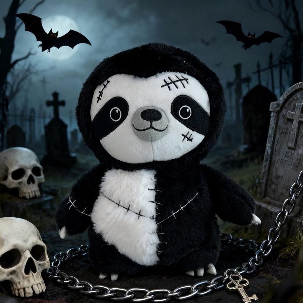 A Black and white sloth plush with some cute scars on him.