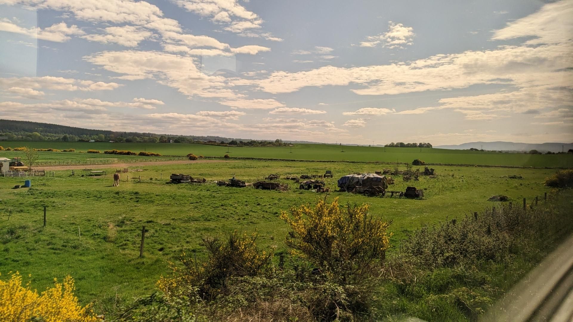 Fields, and mountains in the distance