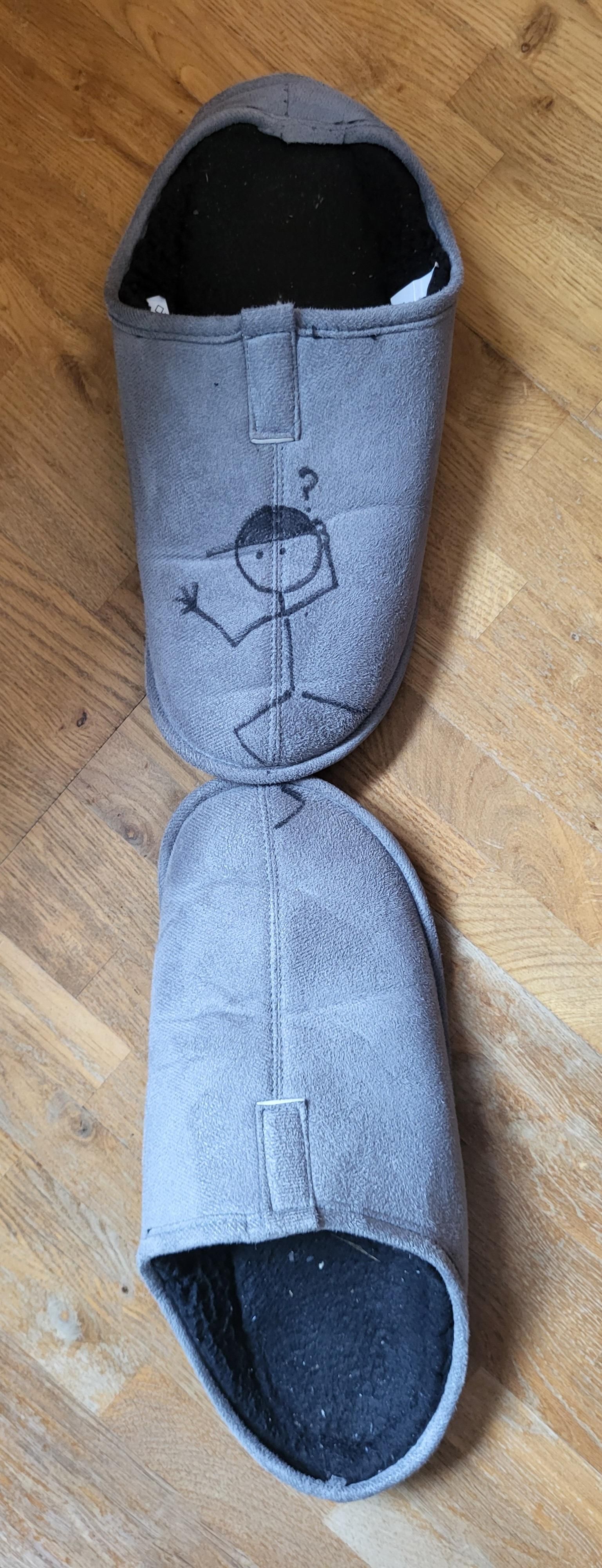 Mine sutsko med en tegning af Streg.