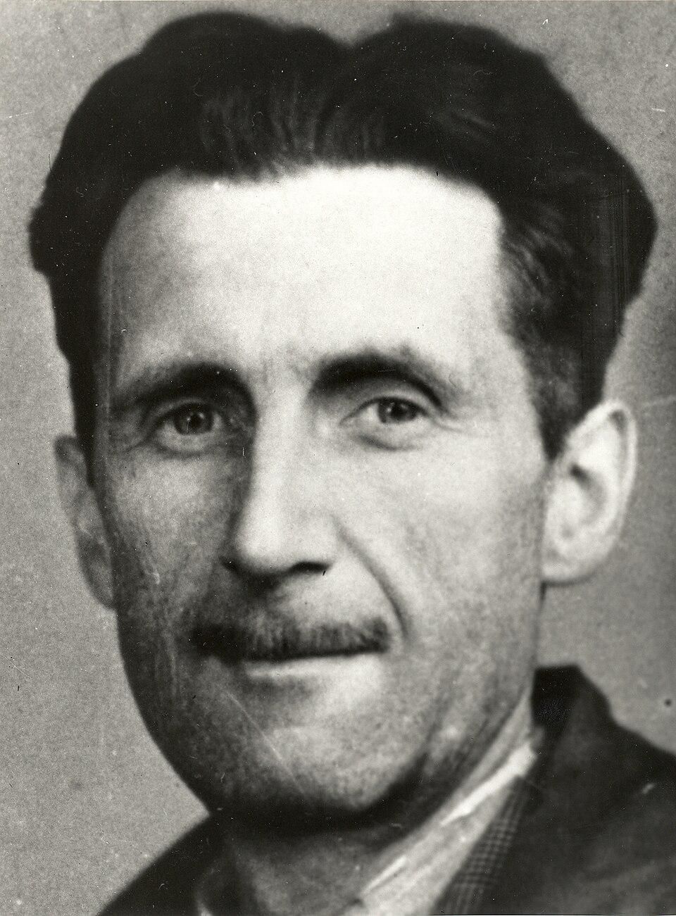 Picture of George Orwell which appears in an old accreditation for the Branch of the National Union of Journalists (BNUJ).

The black and white portrait shows Orwell with his characteristic thin mustache, intense gaze, and slightly disheveled dark hair, likely taken during his years as a journalist and writer in the 1940s.

https://en.wikipedia.org/wiki/George_Orwell#/media/File:George_Orwell_press_photo.jpg