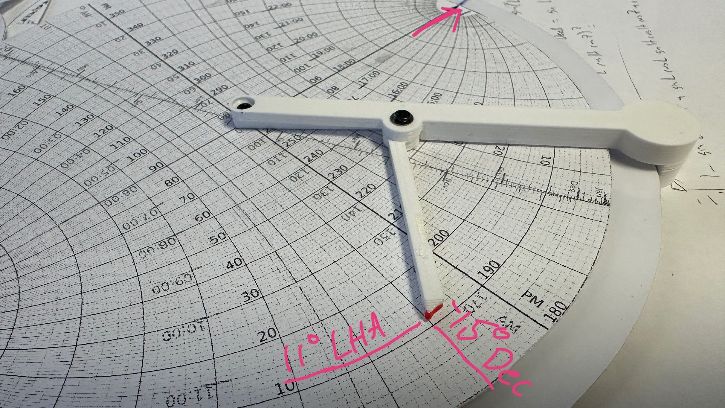 pointer on a universal astrolabe showing the LHA and declination selection
