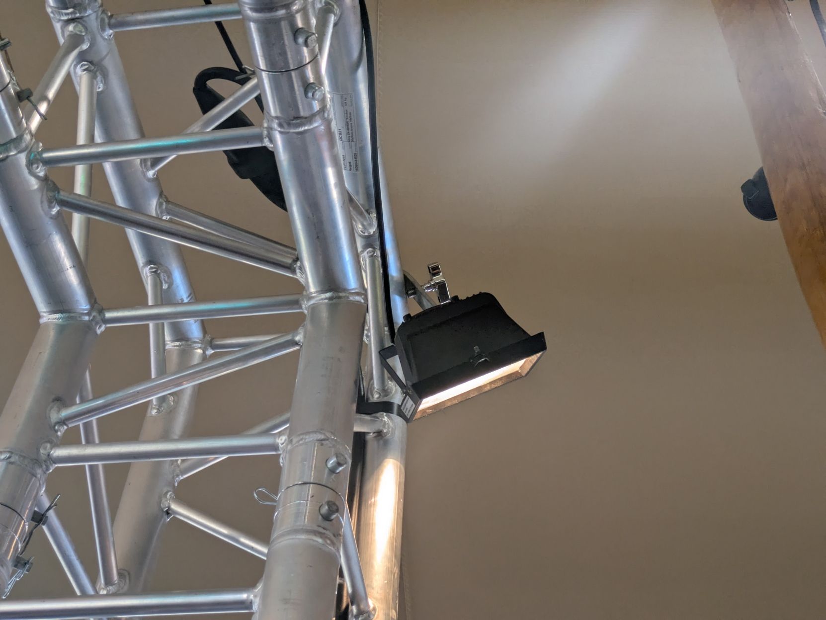 A halogen light on an ordinary hook clamp, with no safety cable in site