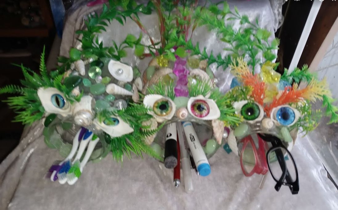 a few of my Aqua Creatures holding items other than fish. Glasses, toothbrushes pens. They are amphibious. Pretty sure.