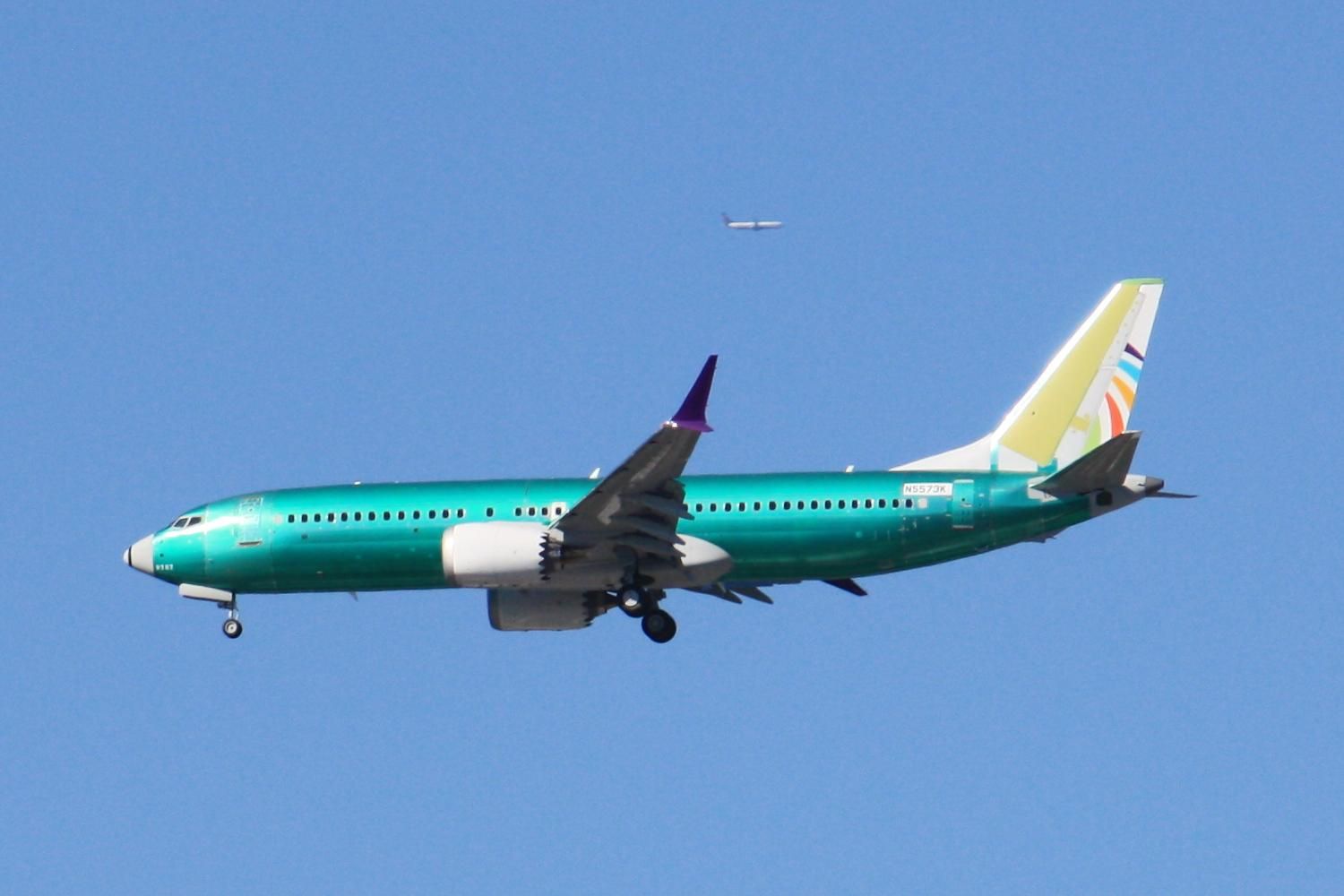unpainted green Boeing 737 MAX8 with a pre-painted rudder indicating the customer for this aircraft is Arajet of the Dominican Republic
The plane was on final approach to Portland International Airport PDX for Runway 28L
In the far background a Delta Airlines Boeing 737 can be seen going the opposite direction (left to right, eastbound) in a position where it may have been also inbound to Portland heading parallel to the approach course until there's a gap in the traffic and Air Traffic Control instructs them to make a right turn to final approach.
photo by Ian Kluft
August 12, 2025
Portland, Oregon, USA