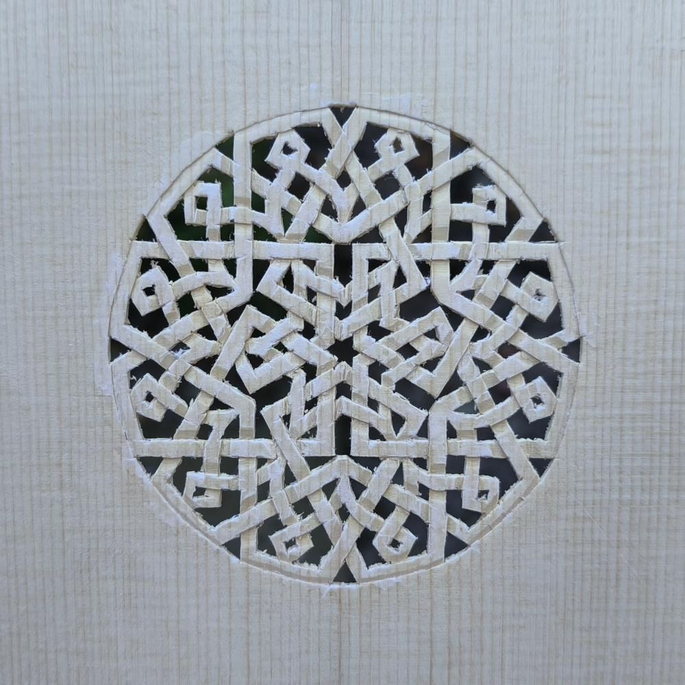 A rose (rosette) I have carved for a colascione (very long-necked lute of the renaissance and baroque period)