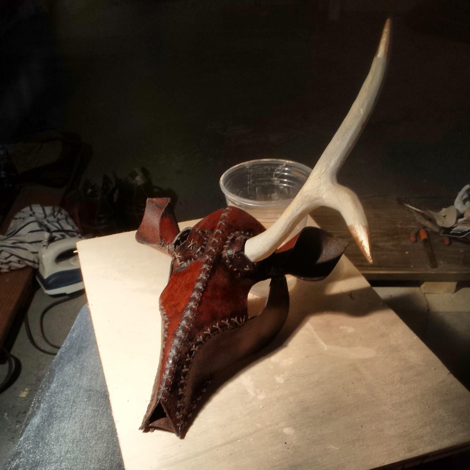 The deer mask with one antler in place for testing.