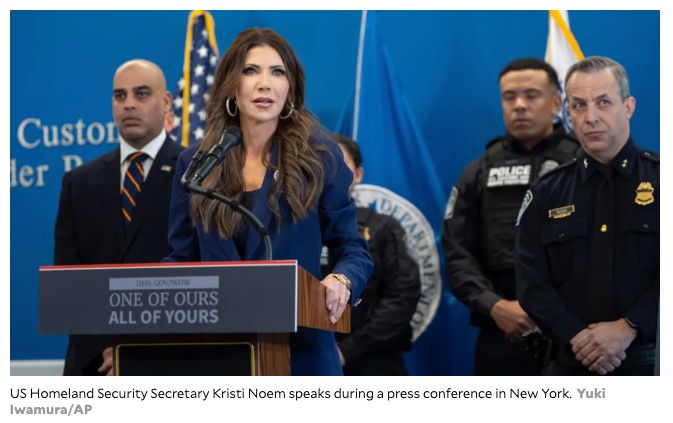 
US Homeland Security Secretary Kristi Noem speaks during a press conference in New York. photo by Uki Iwamura/AP

The text on the podium reads:
ONE OF OURS
ALL OF YOURS
