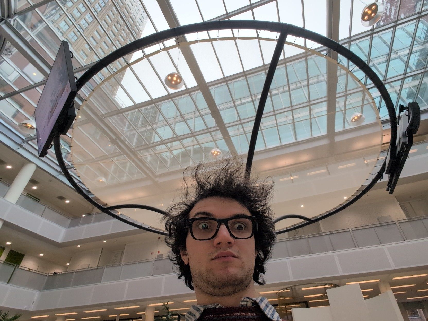 Selfie of me with the thing in the middle of the room.