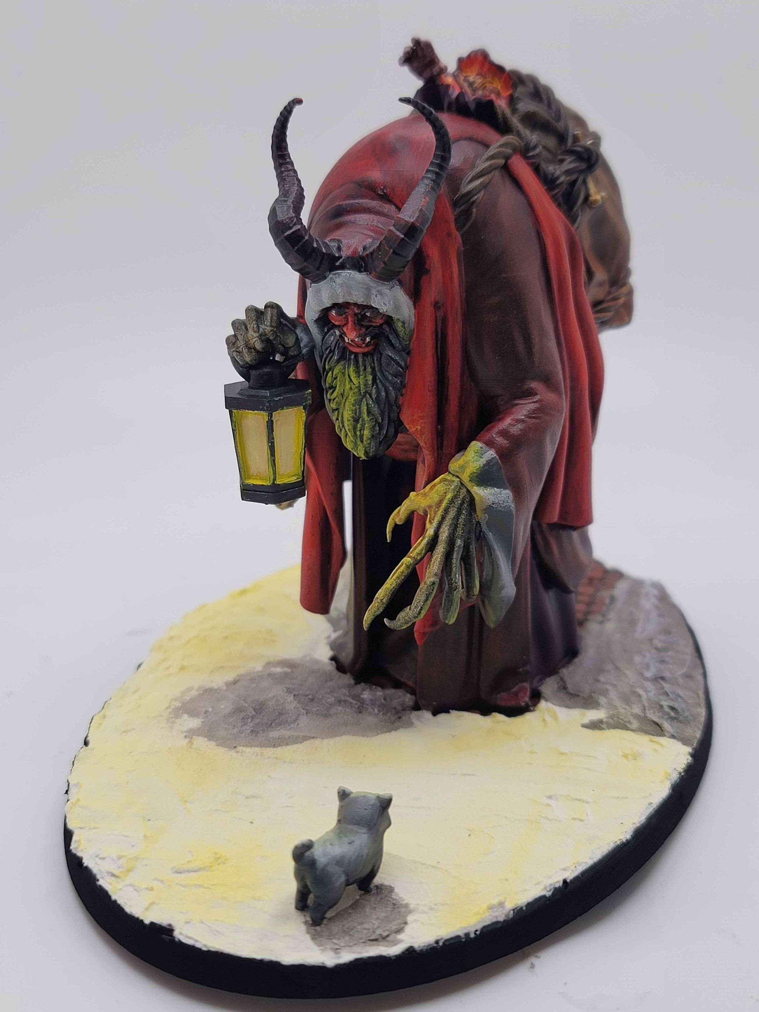 A higher angle on the first picture, letting the lit cuff be seen again, as well as another angle on the light coming from the bag, leaving the child's palm in darkness and silhouette.