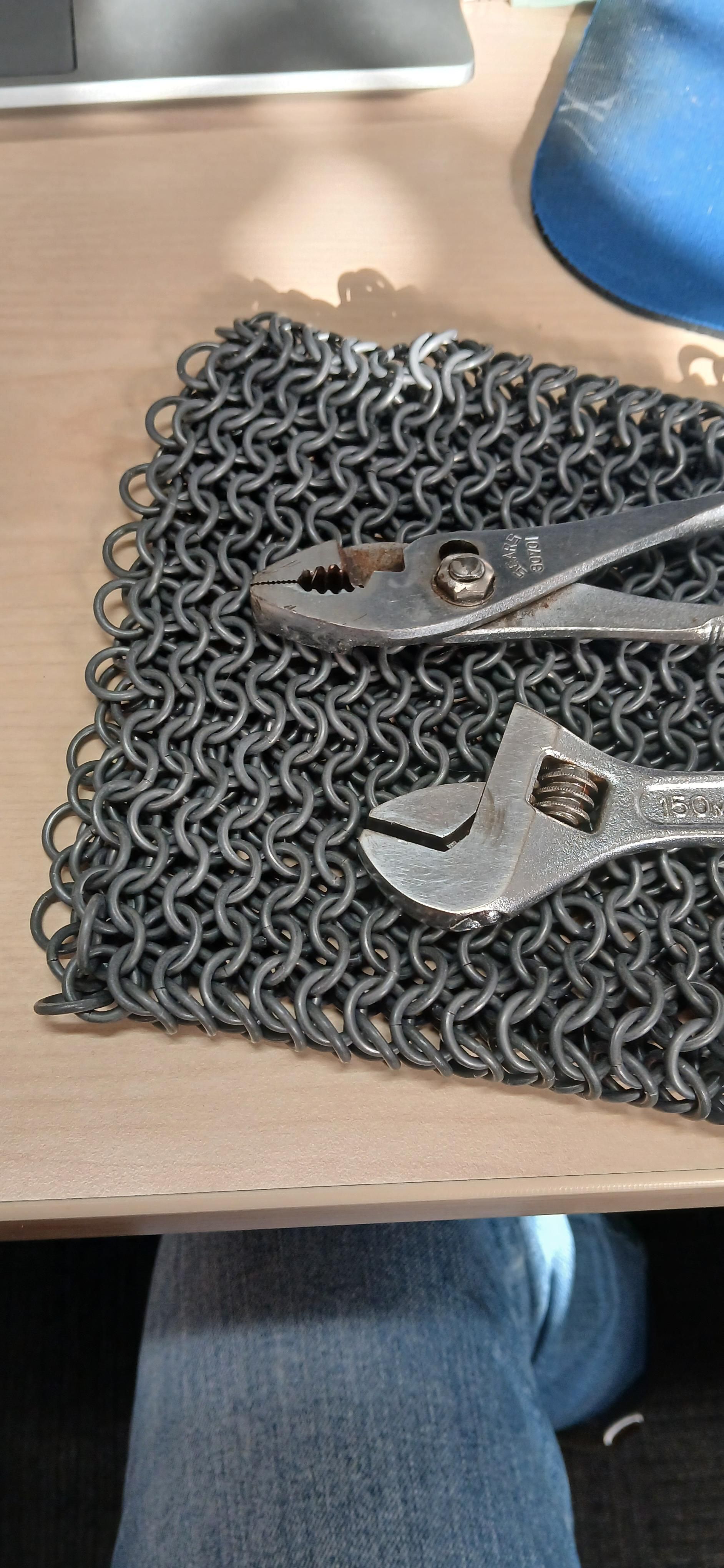 14ga galvanized steel mail with a pliers and adjustable wrench