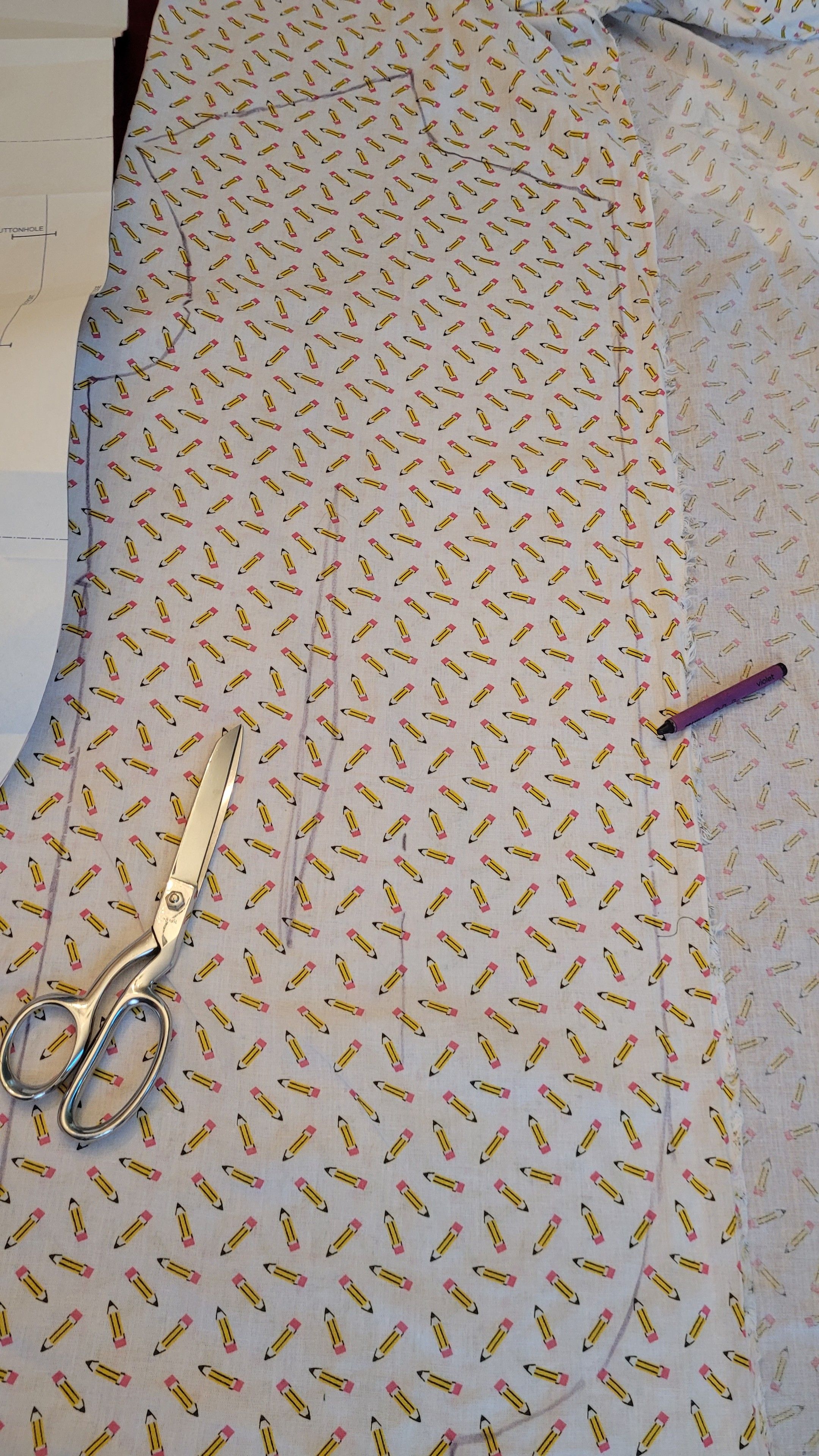 Purple crayon marking fabric