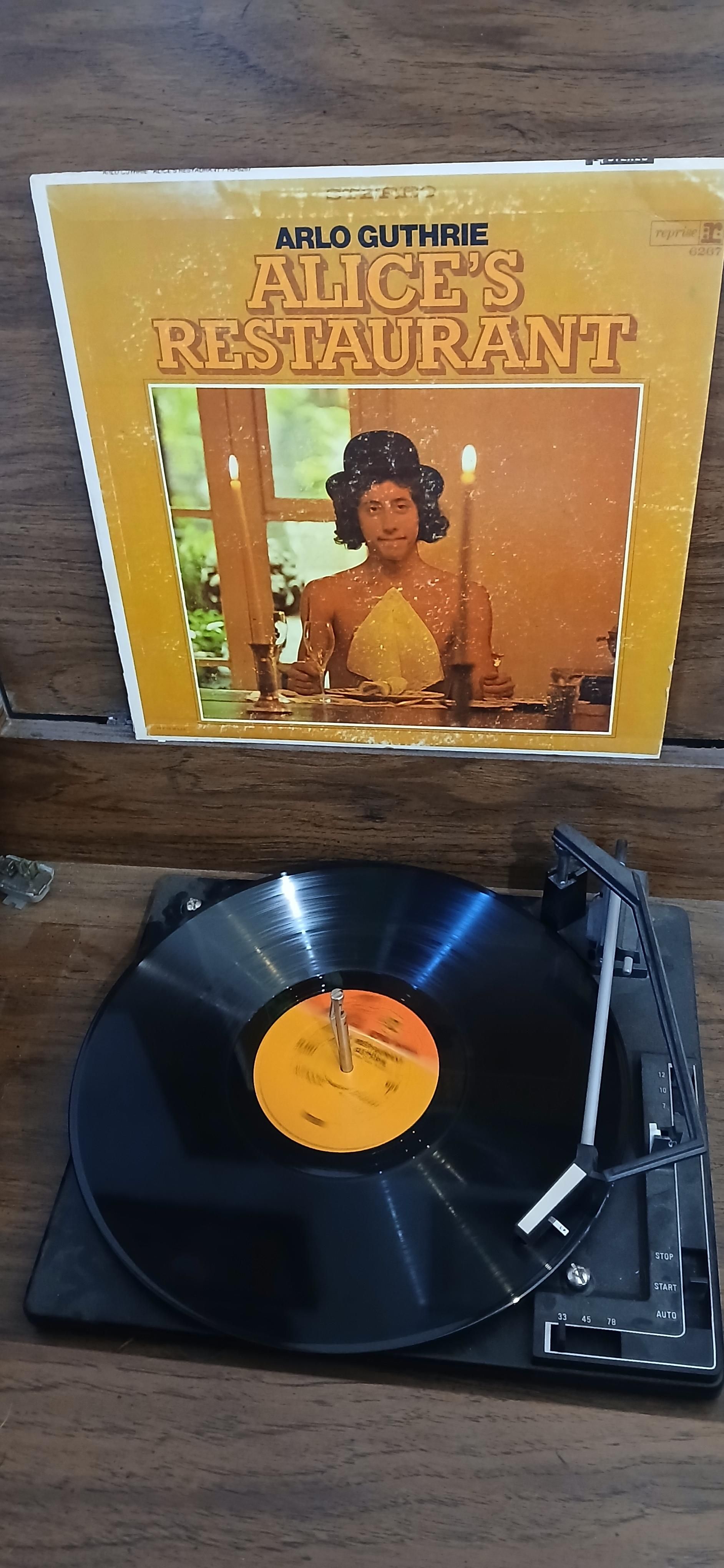 Arlo Guthrie LP of Alice's Restaurant on the turntable 