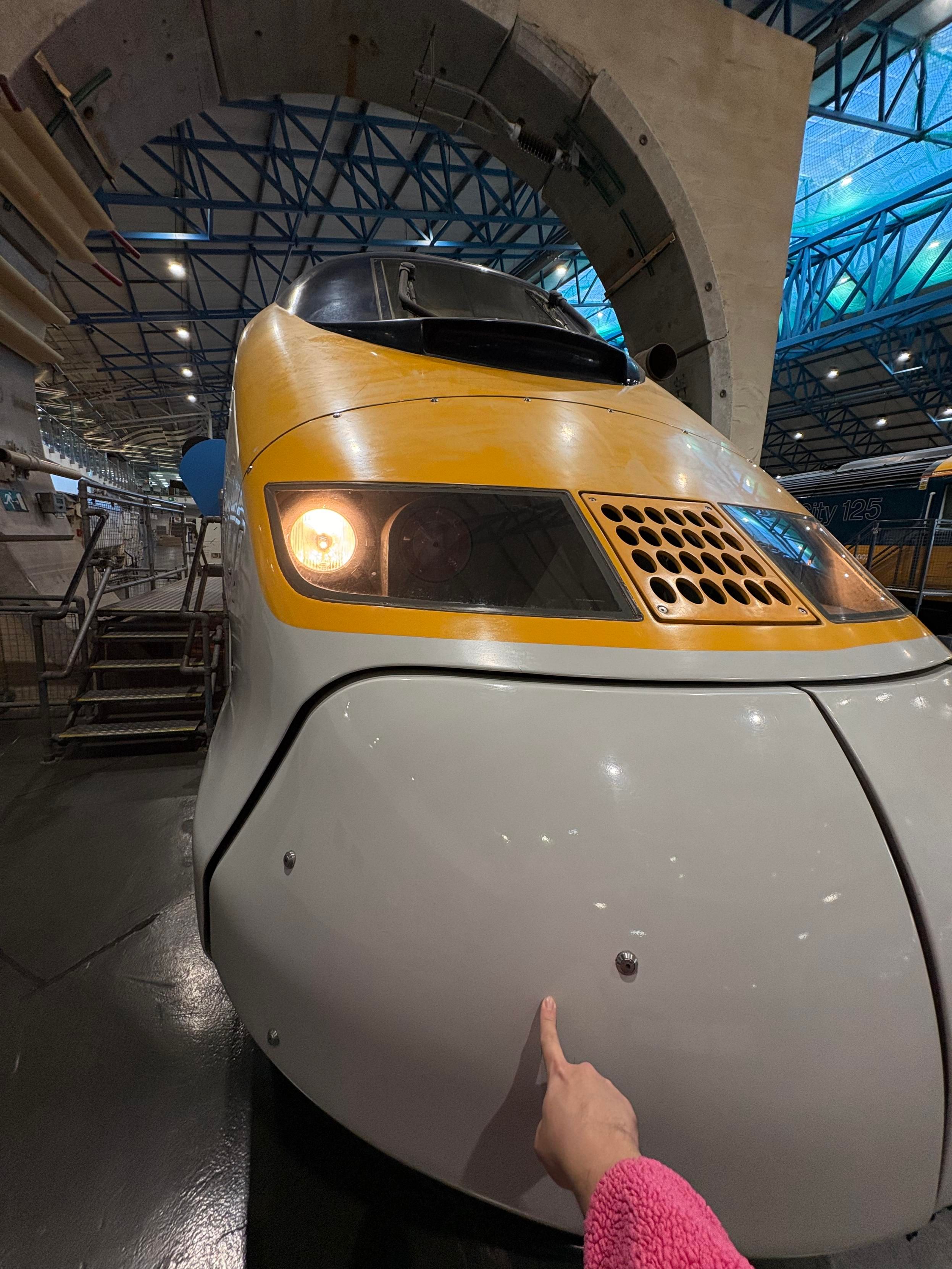 me booping (touching the front end of) the class 373 eurostar train at national railway museum in York