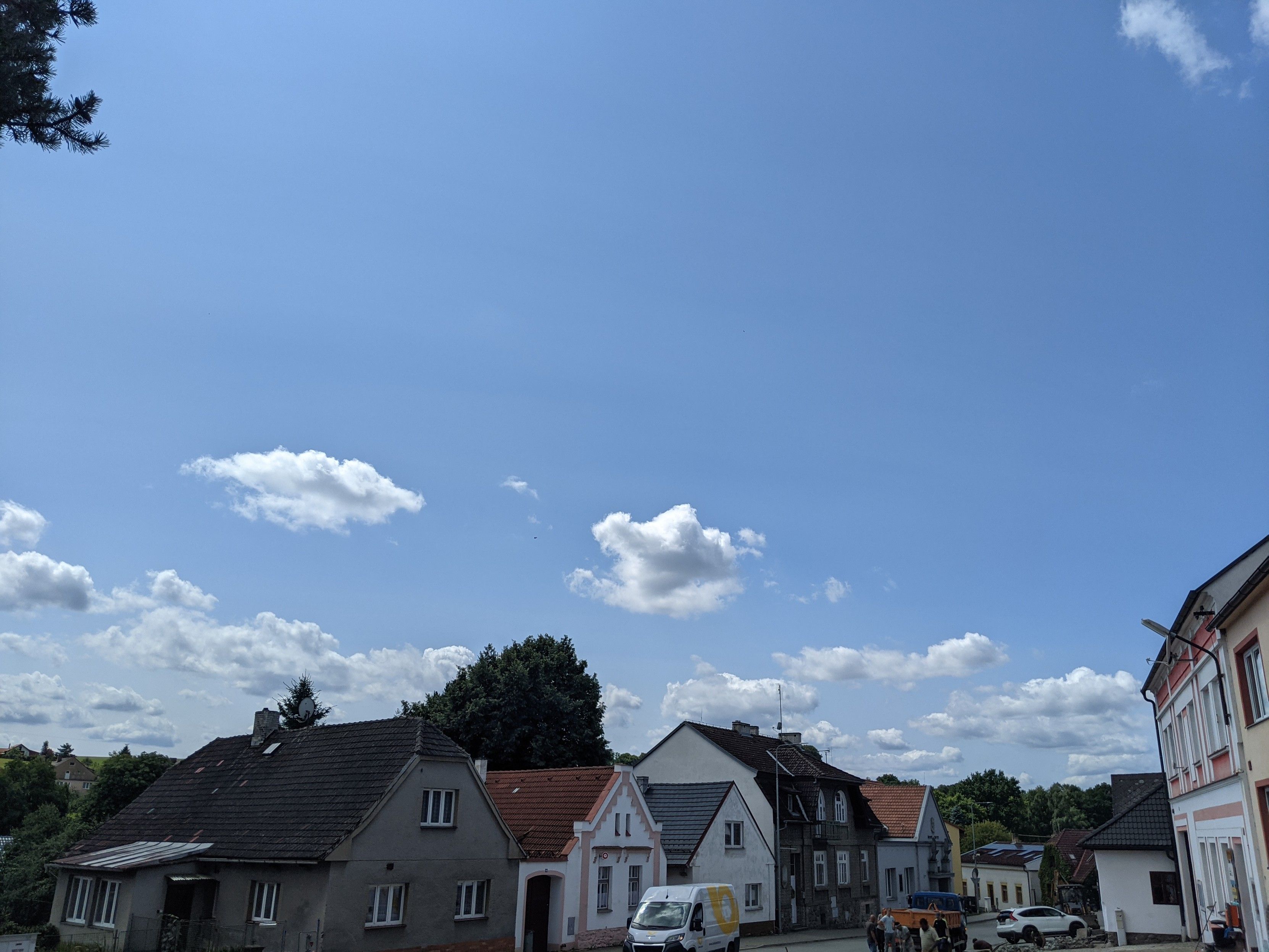 Blue sky with some clouds.